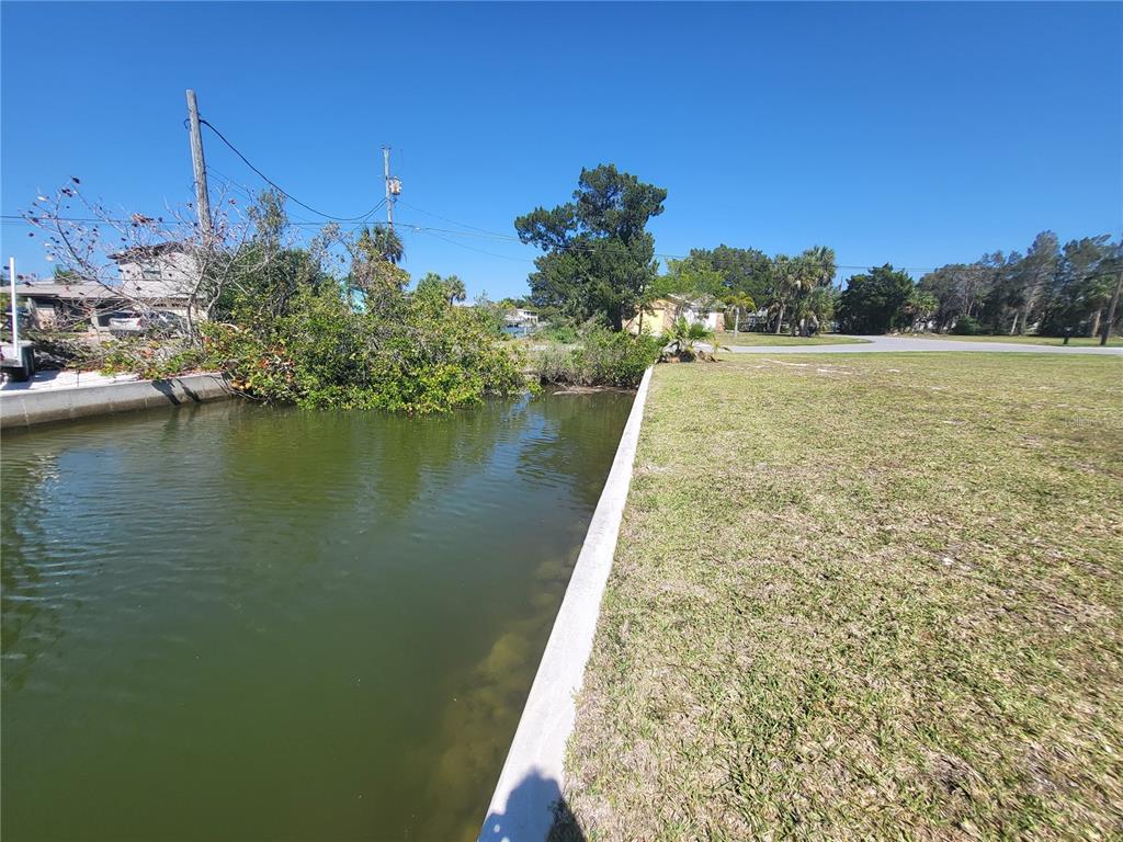 3463 Paragon Terrace Hernando Beach, FL 34607 - Photo 11 of 12 a view of a lake with houses