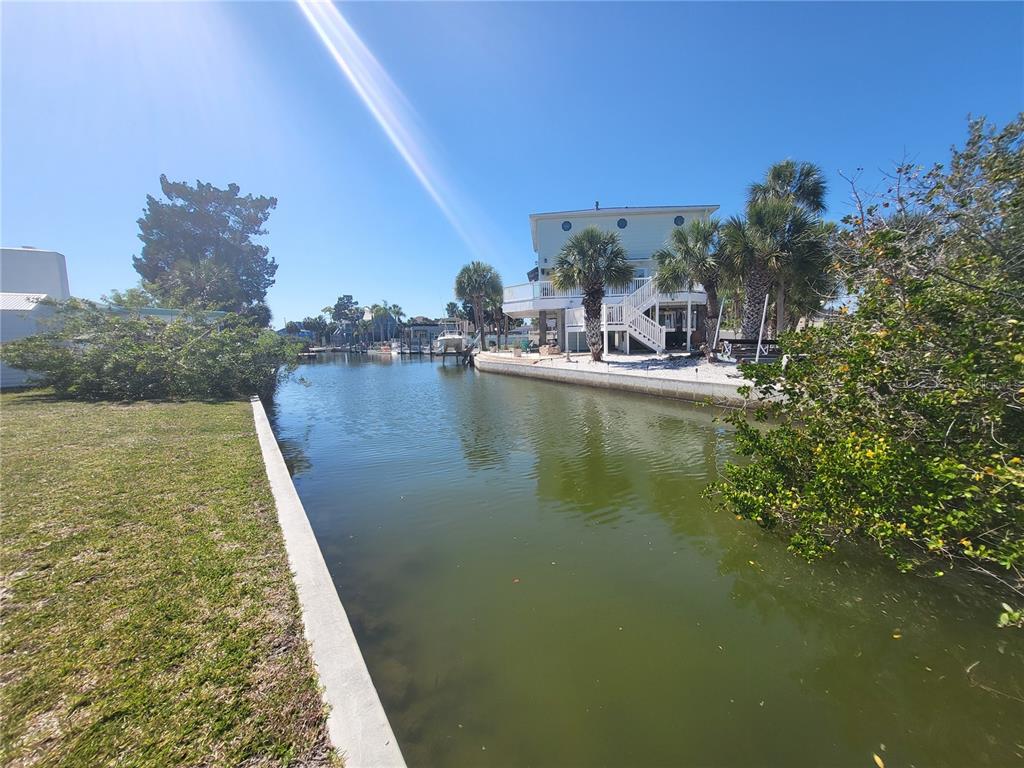 3463 Paragon Terrace Hernando Beach, FL 34607 - Photo 12 of 12 a view of a large body of water with water fall
