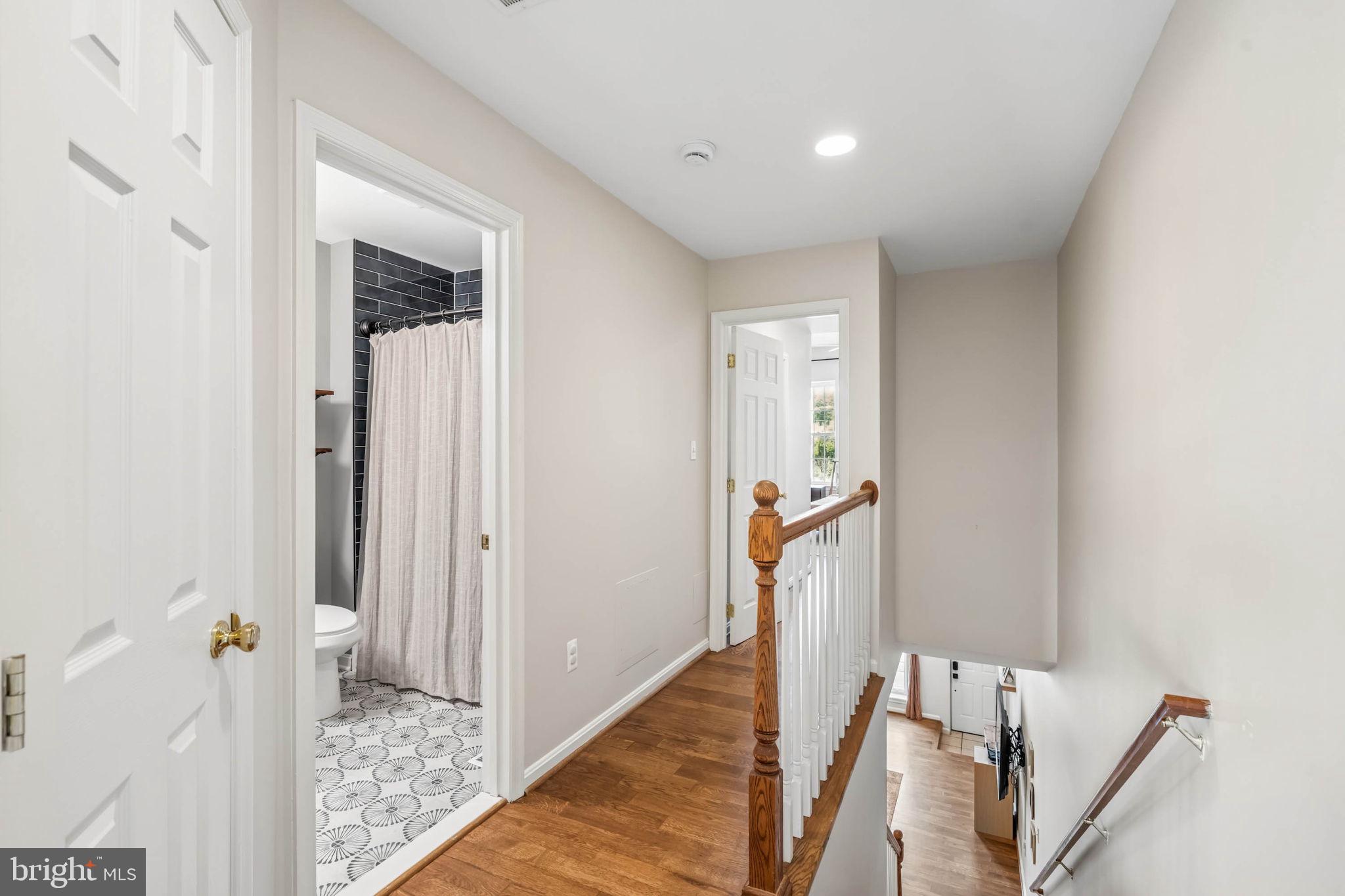 3005 Keswick Road Baltimore, MD 21211 - Photo 15 of 46 Upper-level hall with hardwood floors