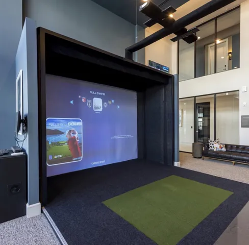 a room with pool table and a chandelier