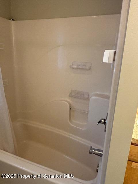 1343 Church Avenue Scranton, PA 18508 - Photo 11 of 22 a bath tub sitting next to a white sink and vanity