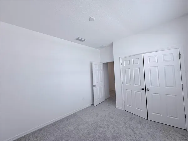 an empty room with an entryway