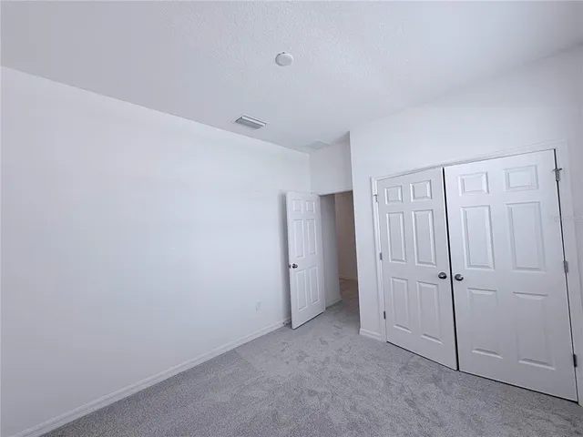 an empty room with an entryway