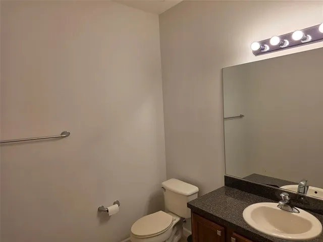 a bathroom with a sink and a toilet