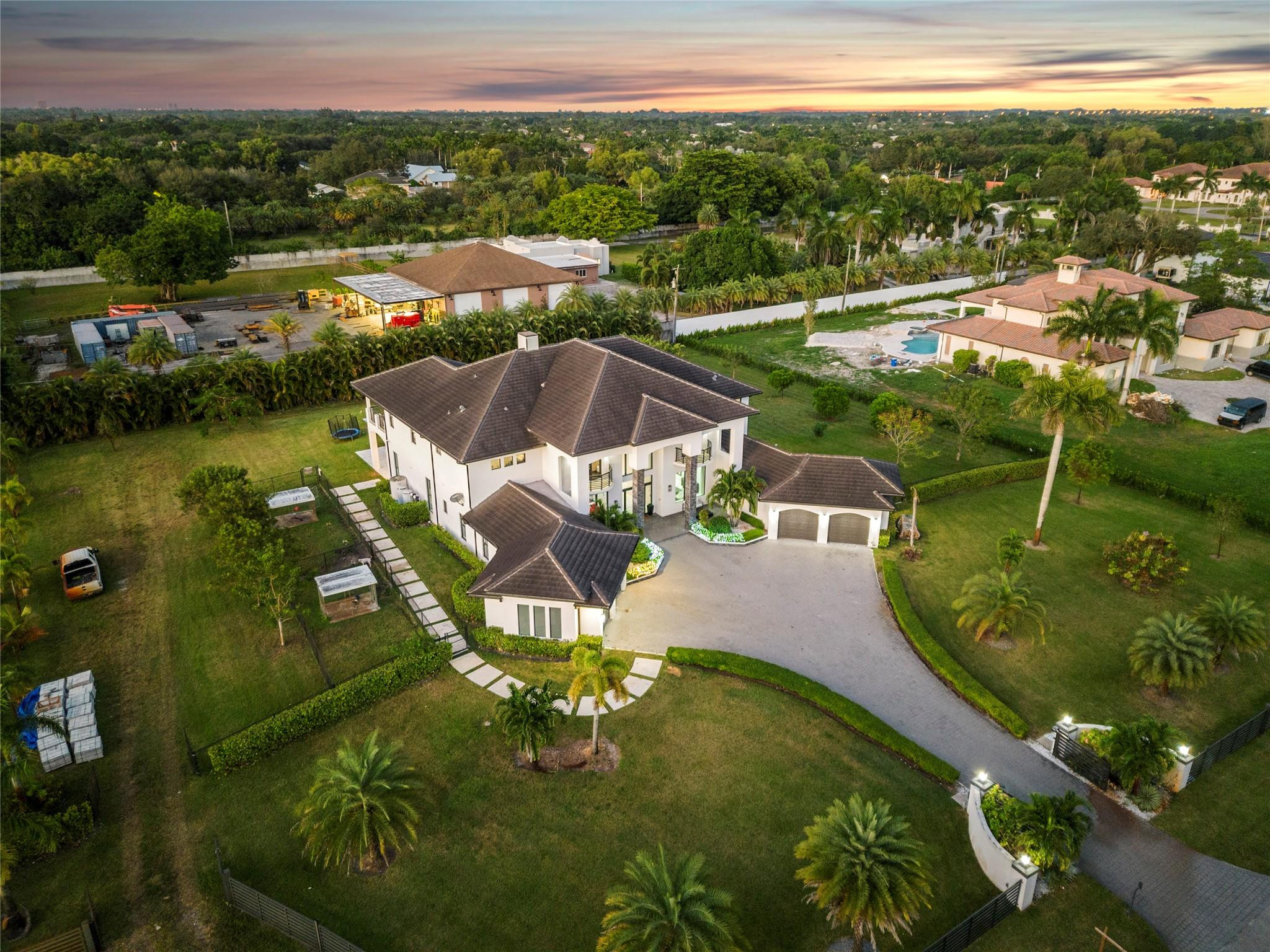 13605 Bella Ranch Lane Southwest Ranches, FL 33330 - Photo 12 of 81 a view of a lake with a yard