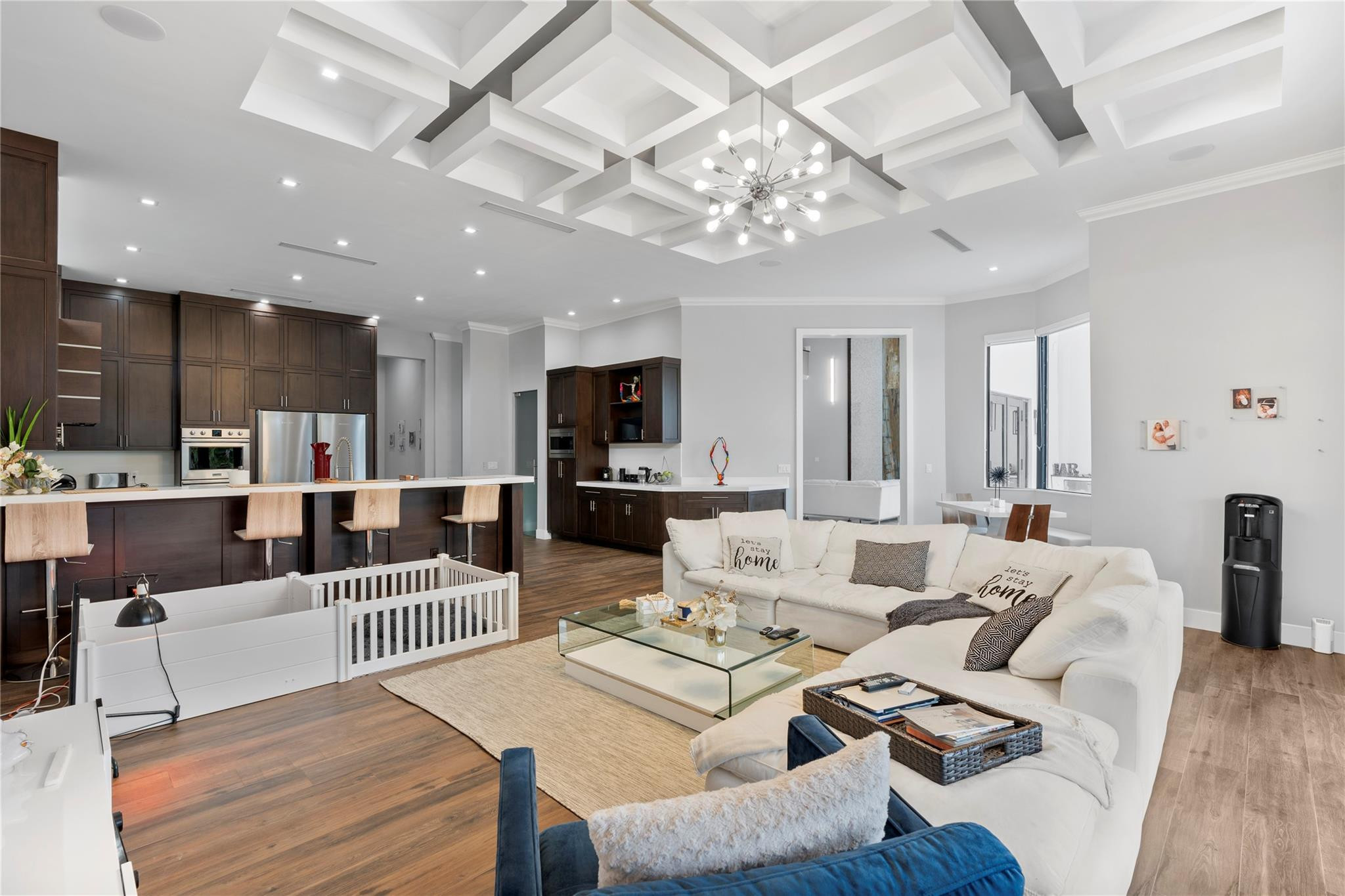 13605 Bella Ranch Lane Southwest Ranches, FL 33330 - Photo 29 of 81 a living room with furniture and a chandelier