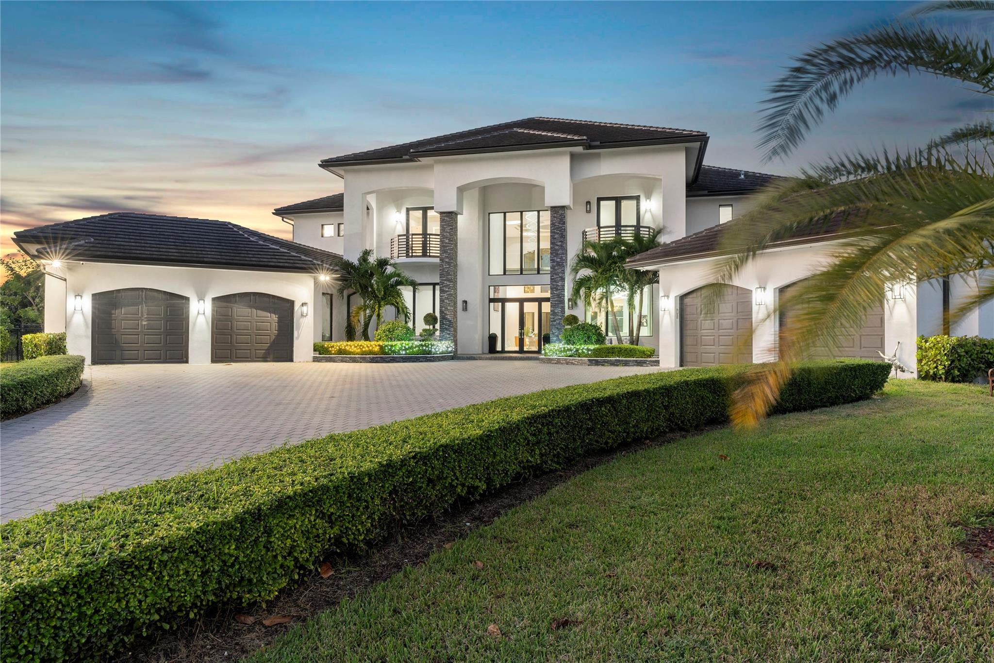 13605 Bella Ranch Lane Southwest Ranches, FL 33330 - Photo 3 of 81 a front view of a house with a yard