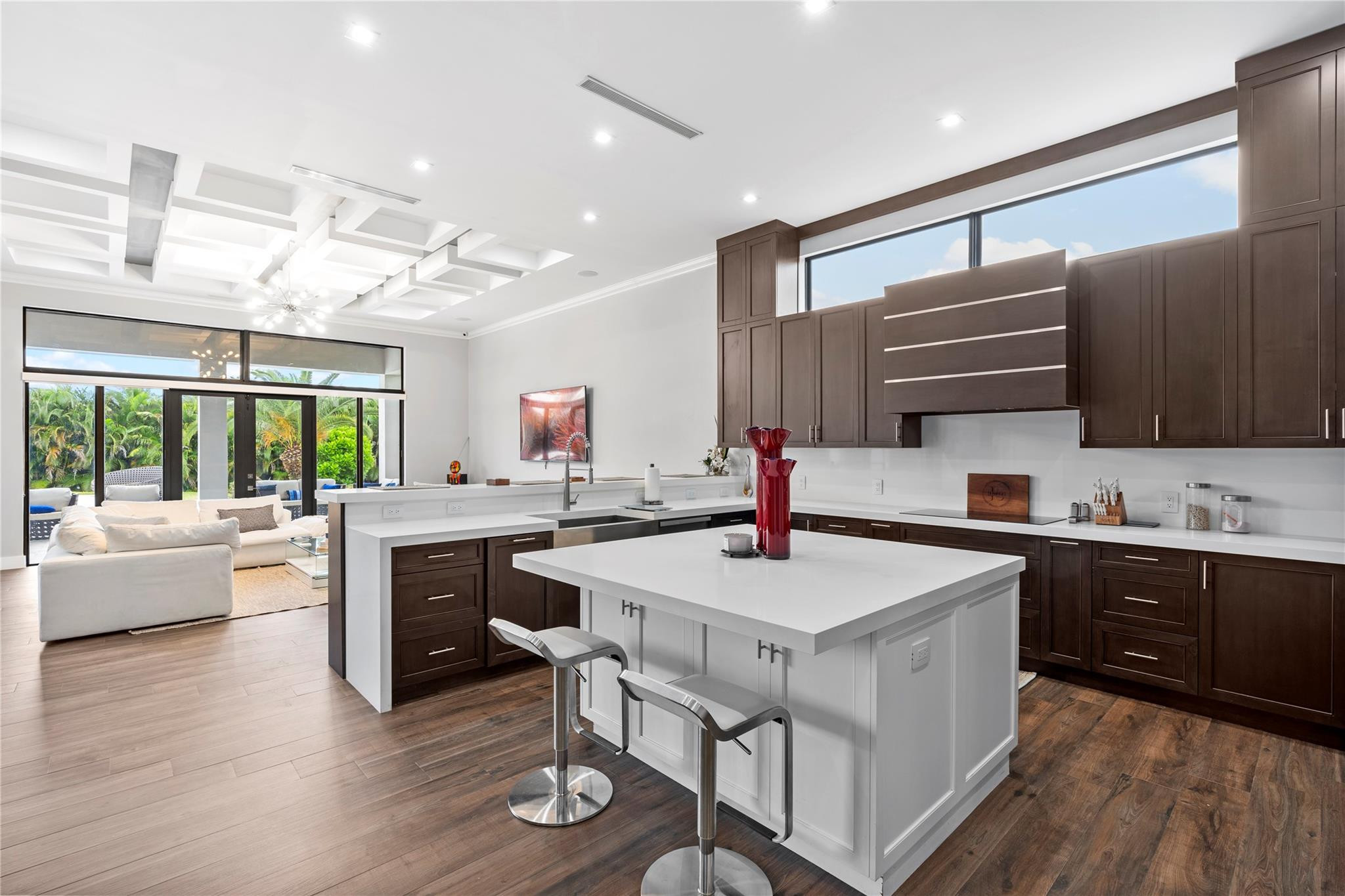 13605 Bella Ranch Lane Southwest Ranches, FL 33330 - Photo 35 of 81 a kitchen with sink cabinets and wooden floor
