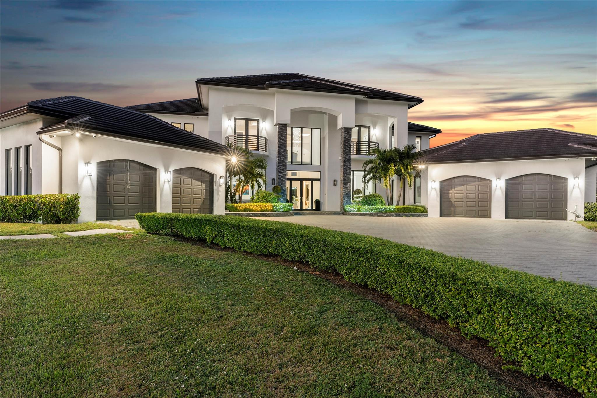13605 Bella Ranch Lane Southwest Ranches, FL 33330 - Photo 4 of 81 a front view of a house with a yard