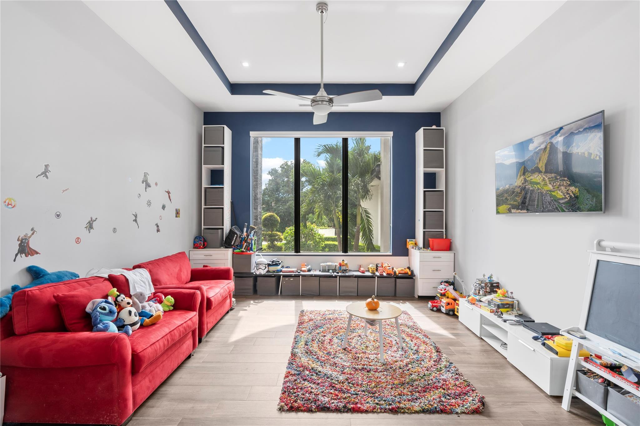13605 Bella Ranch Lane Southwest Ranches, FL 33330 - Photo 43 of 81 a living room with furniture and a large window
