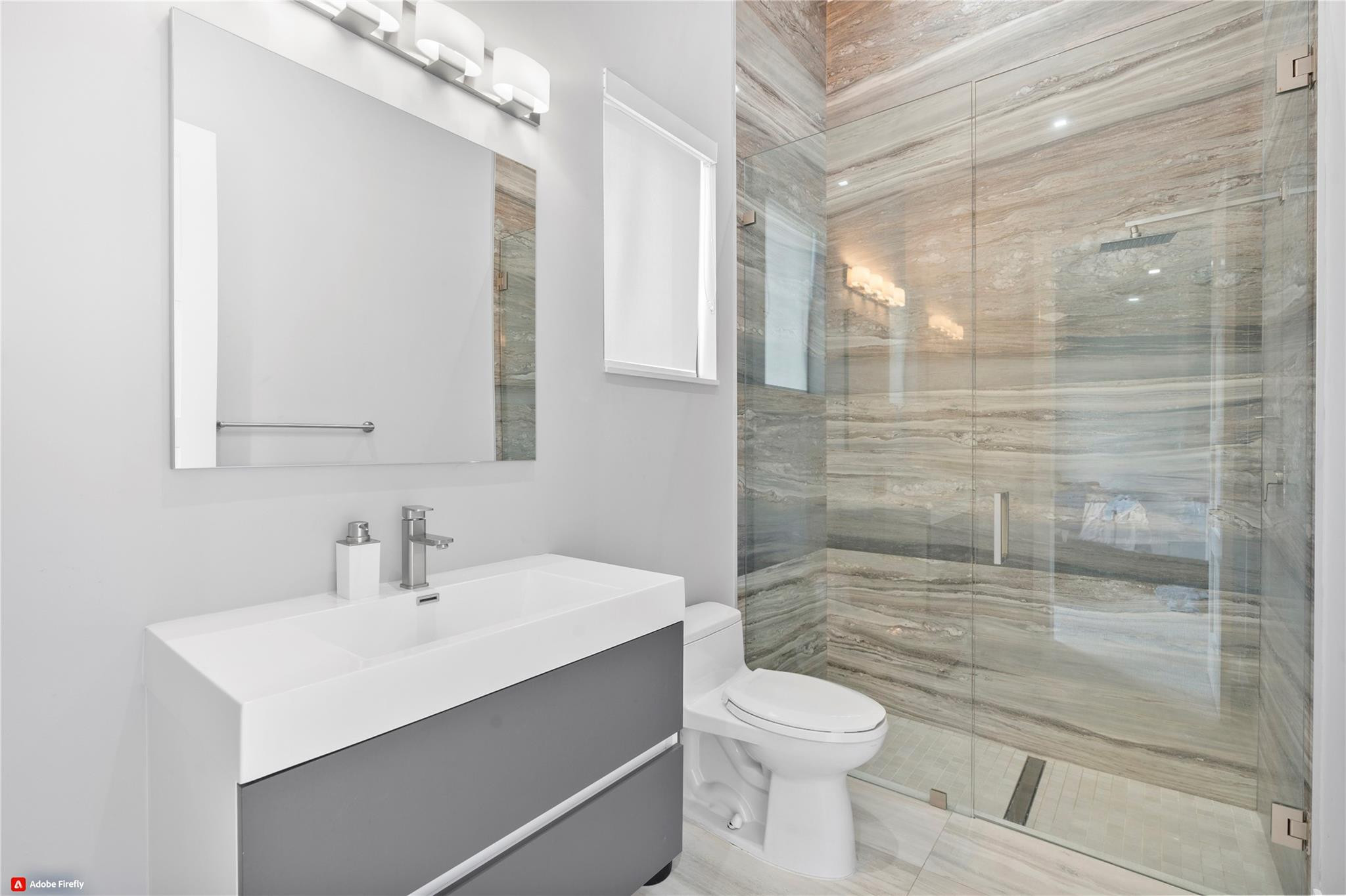 13605 Bella Ranch Lane Southwest Ranches, FL 33330 - Photo 45 of 81 a bathroom with a sink toilet and shower