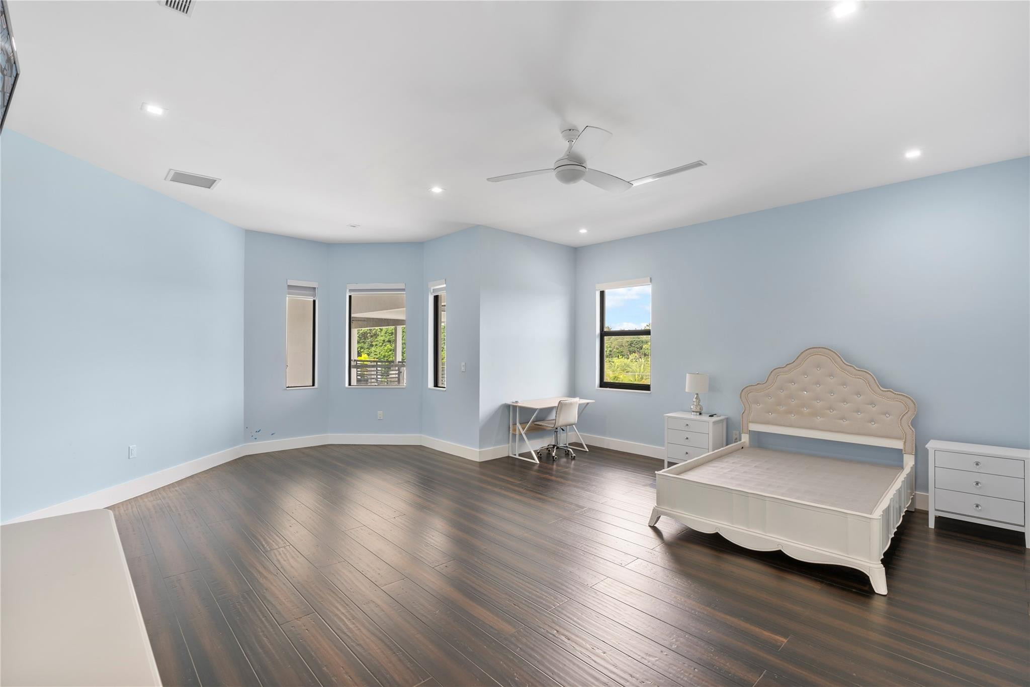 13605 Bella Ranch Lane Southwest Ranches, FL 33330 - Photo 71 of 81 a living room with couch and a wooden floor