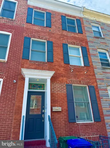a building view with a brick wall