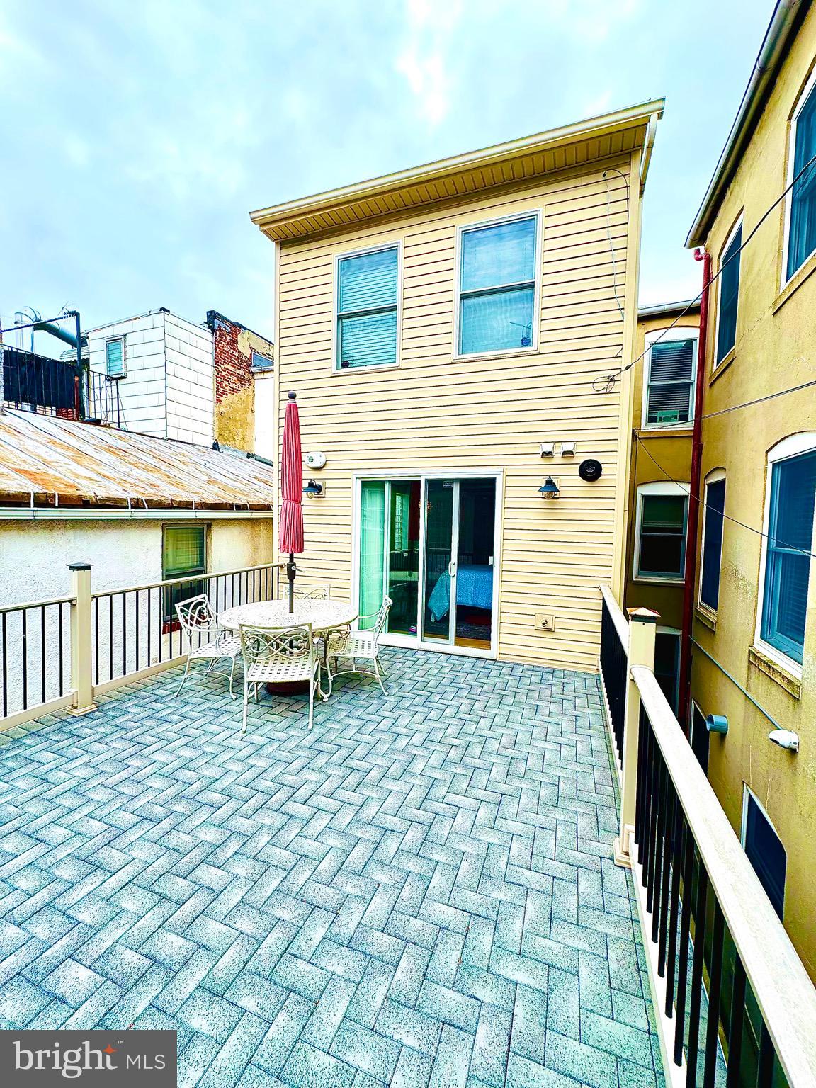 306 South Exeter Street Baltimore, MD 21202 - Photo 34 of 35 a front view of a house with a large window