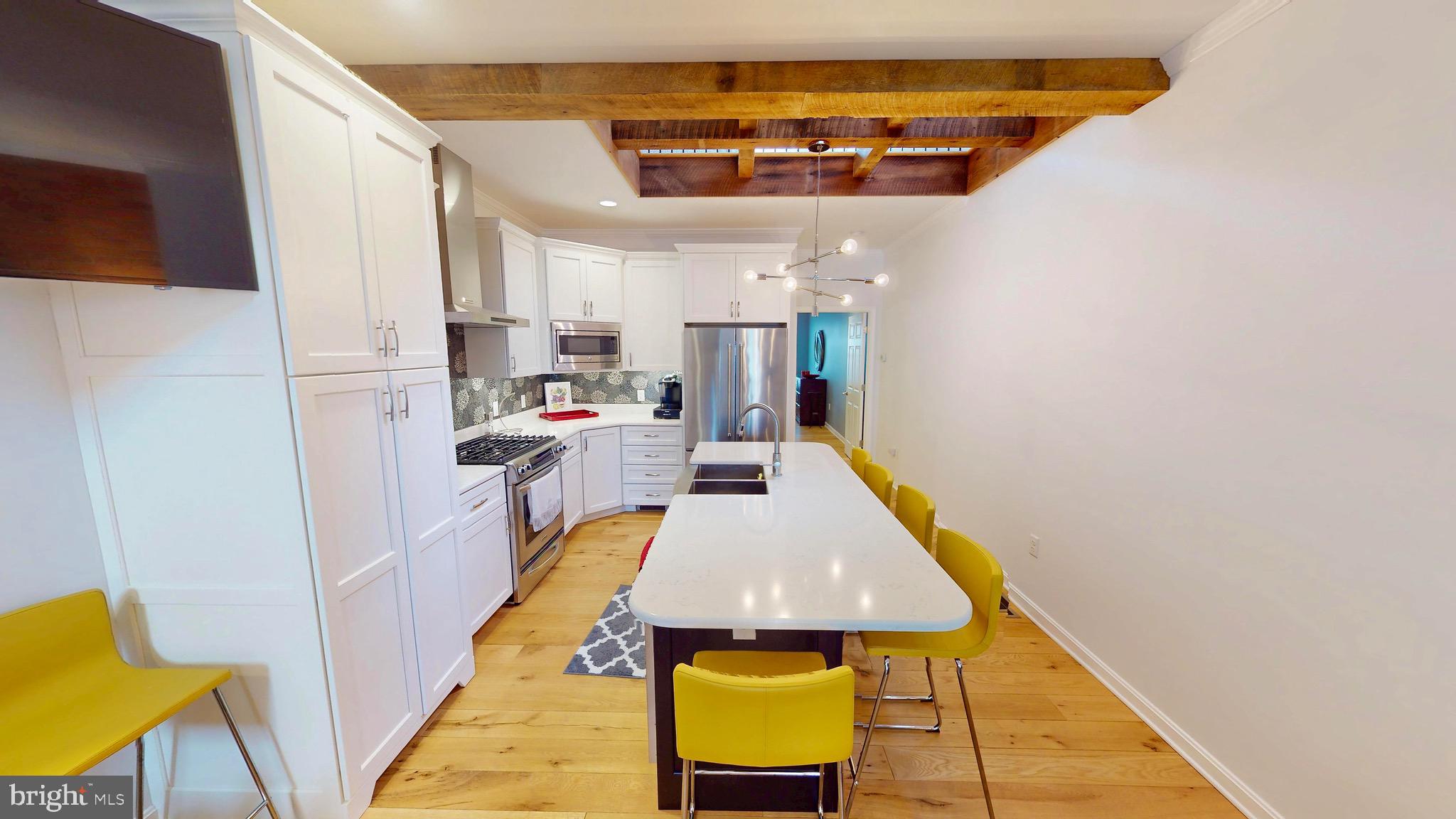 306 South Exeter Street Baltimore, MD 21202 - Photo 7 of 35 a very nice looking room with a kitchen