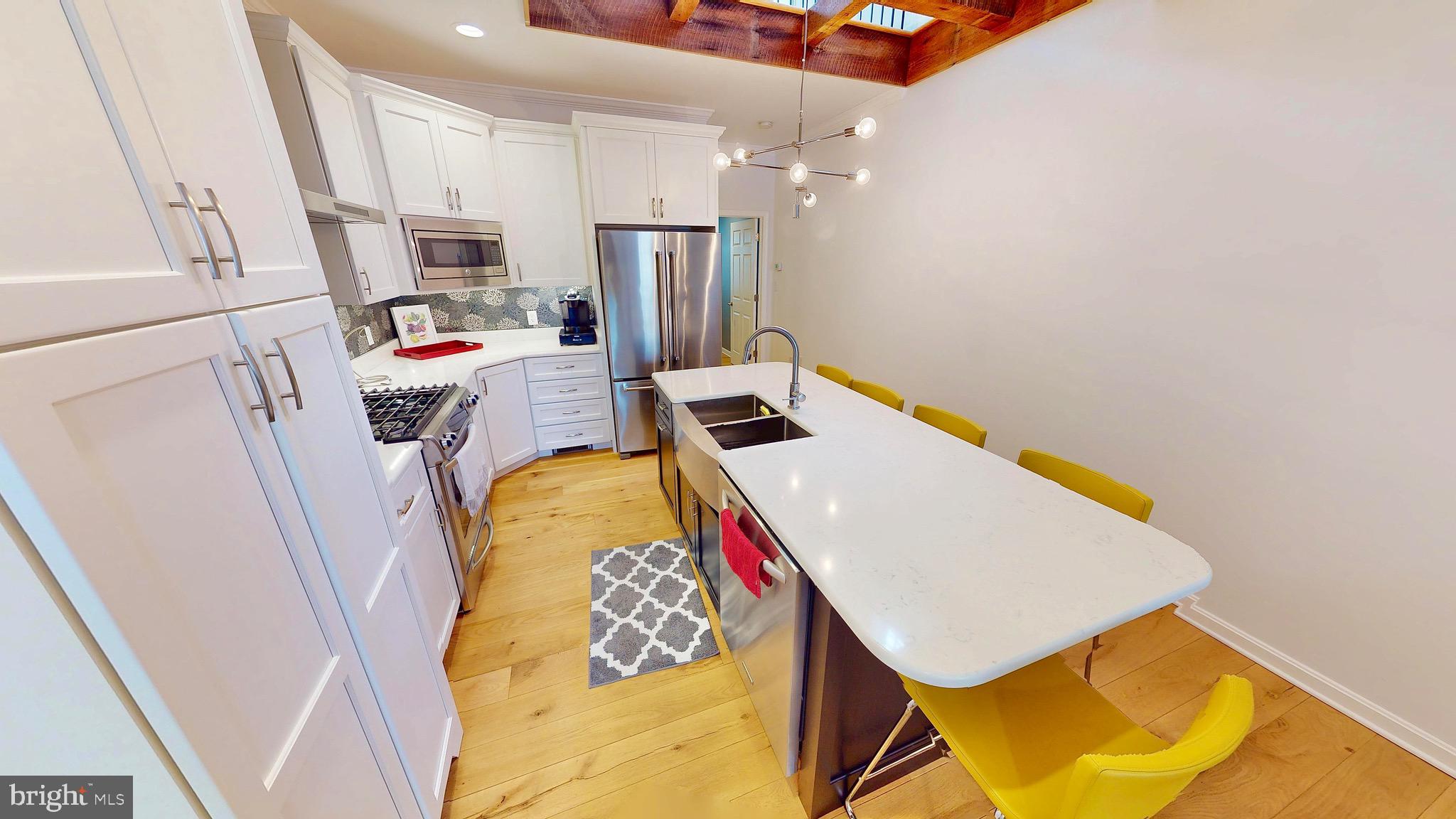 306 South Exeter Street Baltimore, MD 21202 - Photo 8 of 35 a utility room with dryer and washer