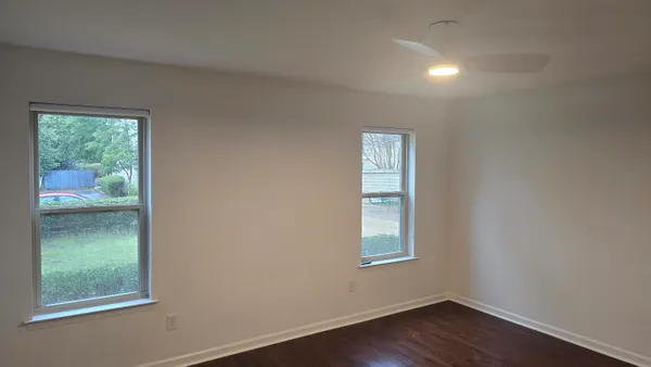 a view of an empty room and window