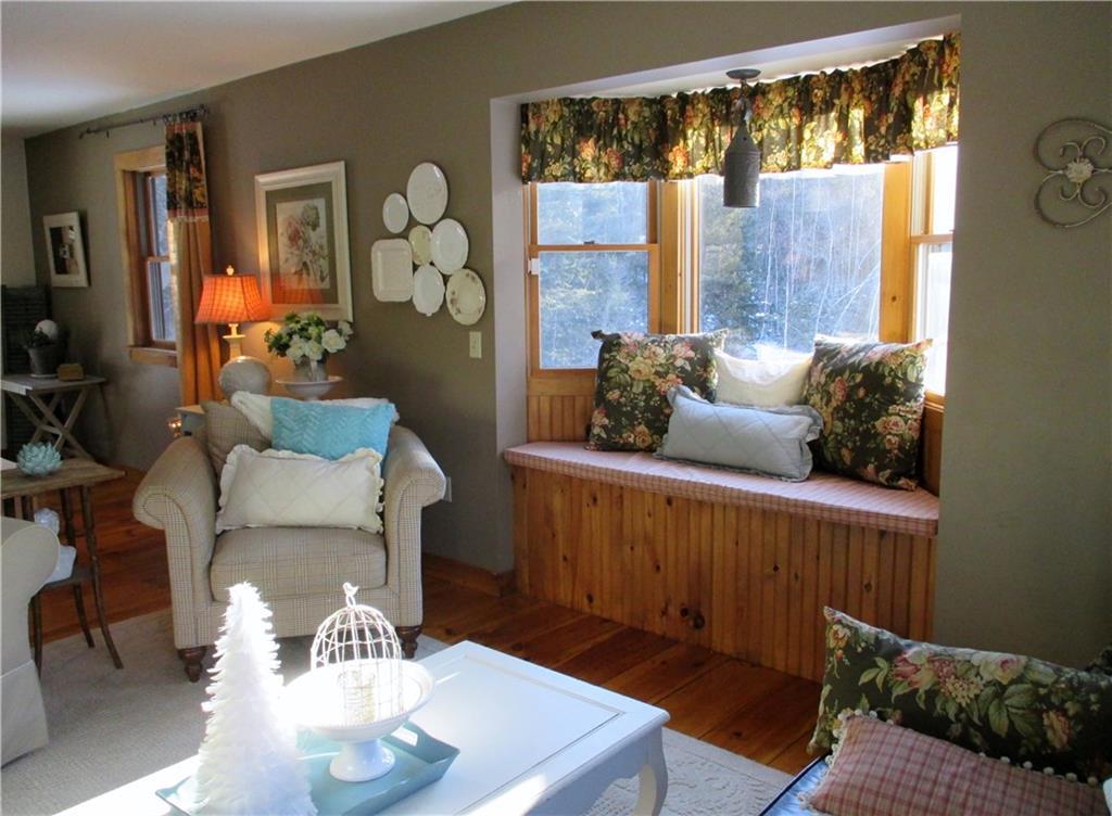 746 Pleasant View Ridge Road South China, ME 04358 - Photo 10 of 29 Living room window seat.