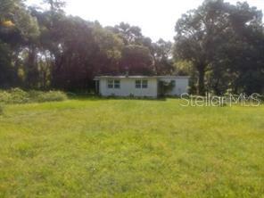 2819 Aein Road Orlando, FL 32817 - Photo 1 of 1 a view of a playground with basketball court