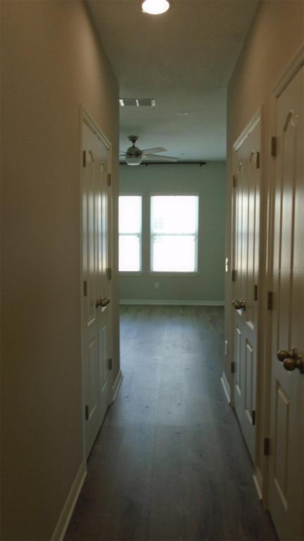 466 Windmill Palm Circle Altamonte Springs, FL 32701 - Photo 11 of 23 an empty room with windows and entrance