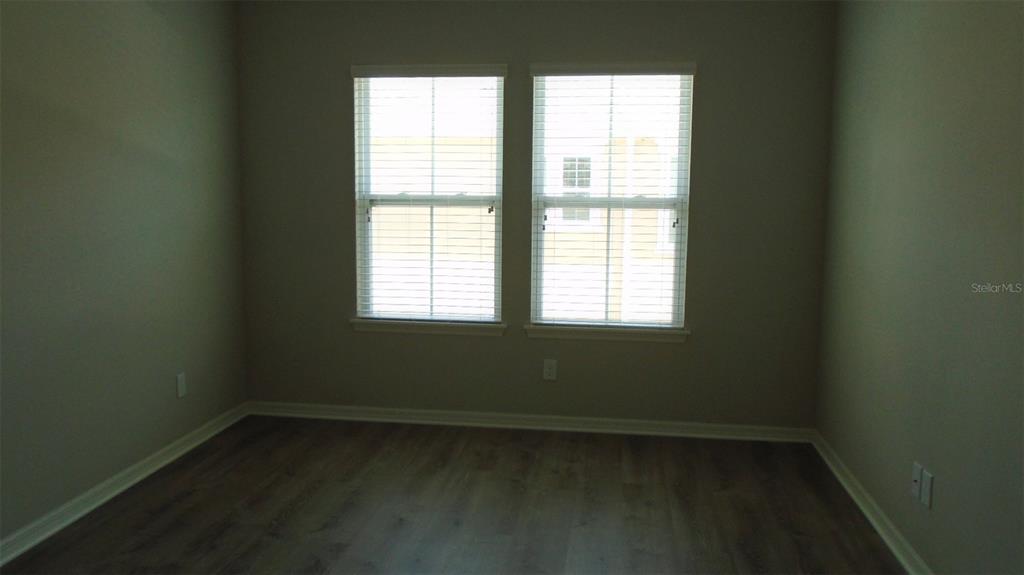 466 Windmill Palm Circle Altamonte Springs, FL 32701 - Photo 9 of 23 a view of an empty room with a window