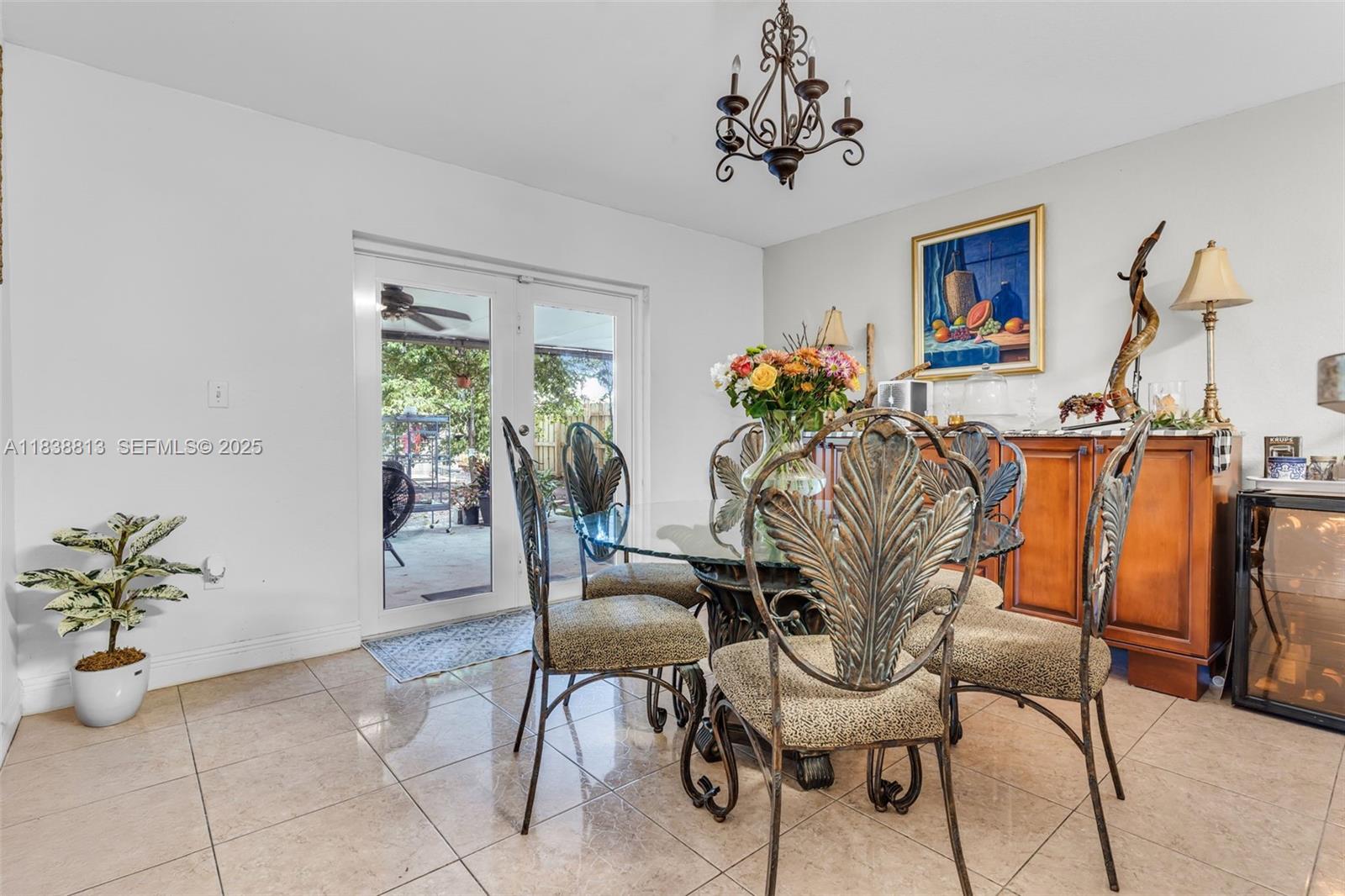 25237 Southwest 133rd Place Homestead, FL 33032 - Photo 15 of 39 a view of a dining room with furniture window and outside view