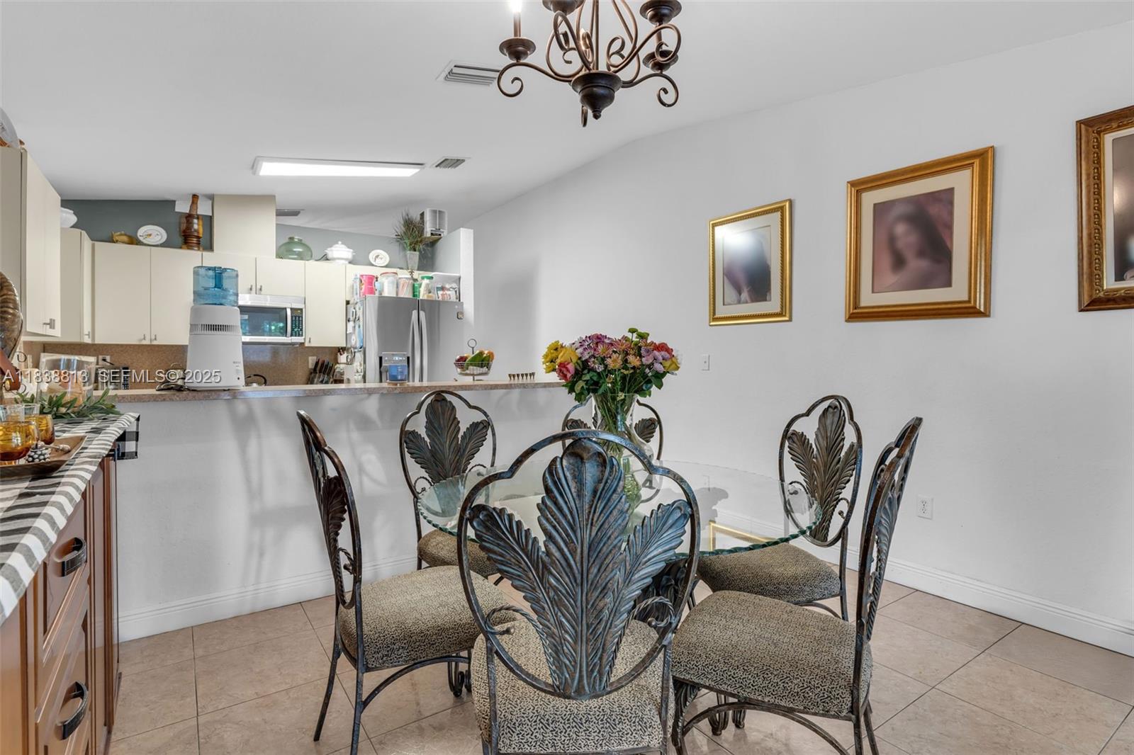 25237 Southwest 133rd Place Homestead, FL 33032 - Photo 16 of 39 a view of a dining room with furniture