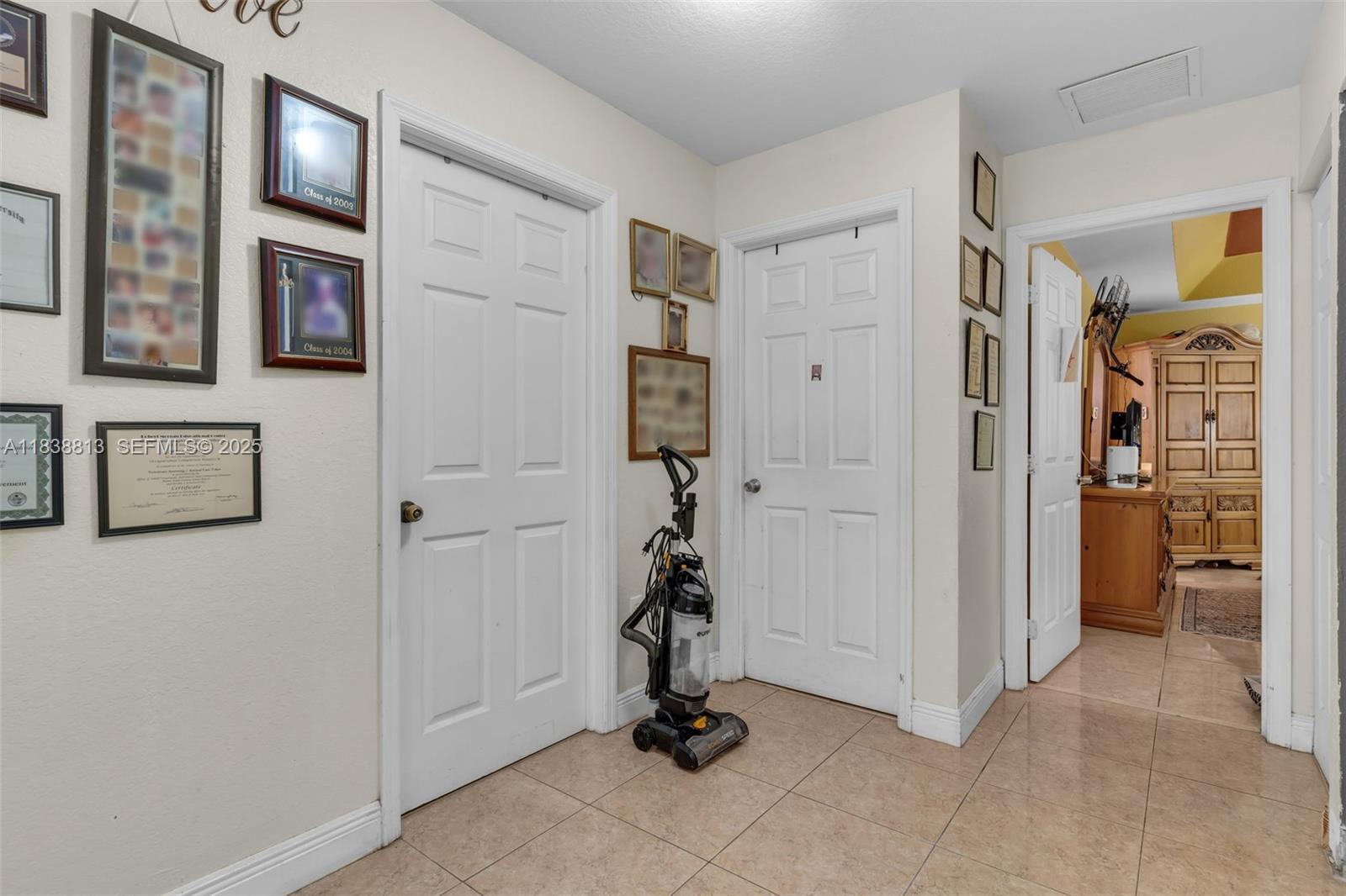 25237 Southwest 133rd Place Homestead, FL 33032 - Photo 27 of 39 a view of livingroom with walk in closet and window