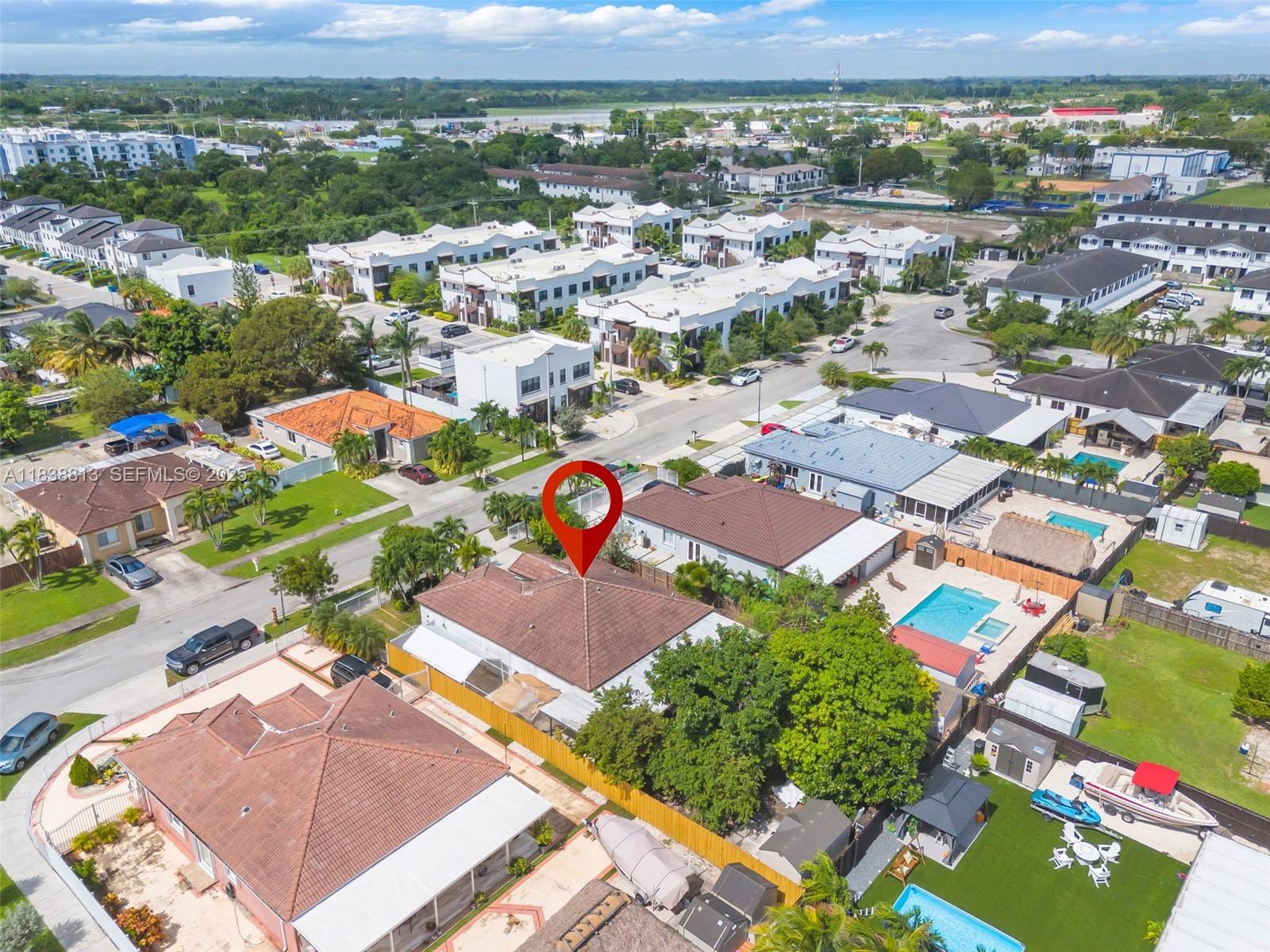 25237 Southwest 133rd Place Homestead, FL 33032 - Photo 6 of 39 an aerial view of residential houses with outdoor space