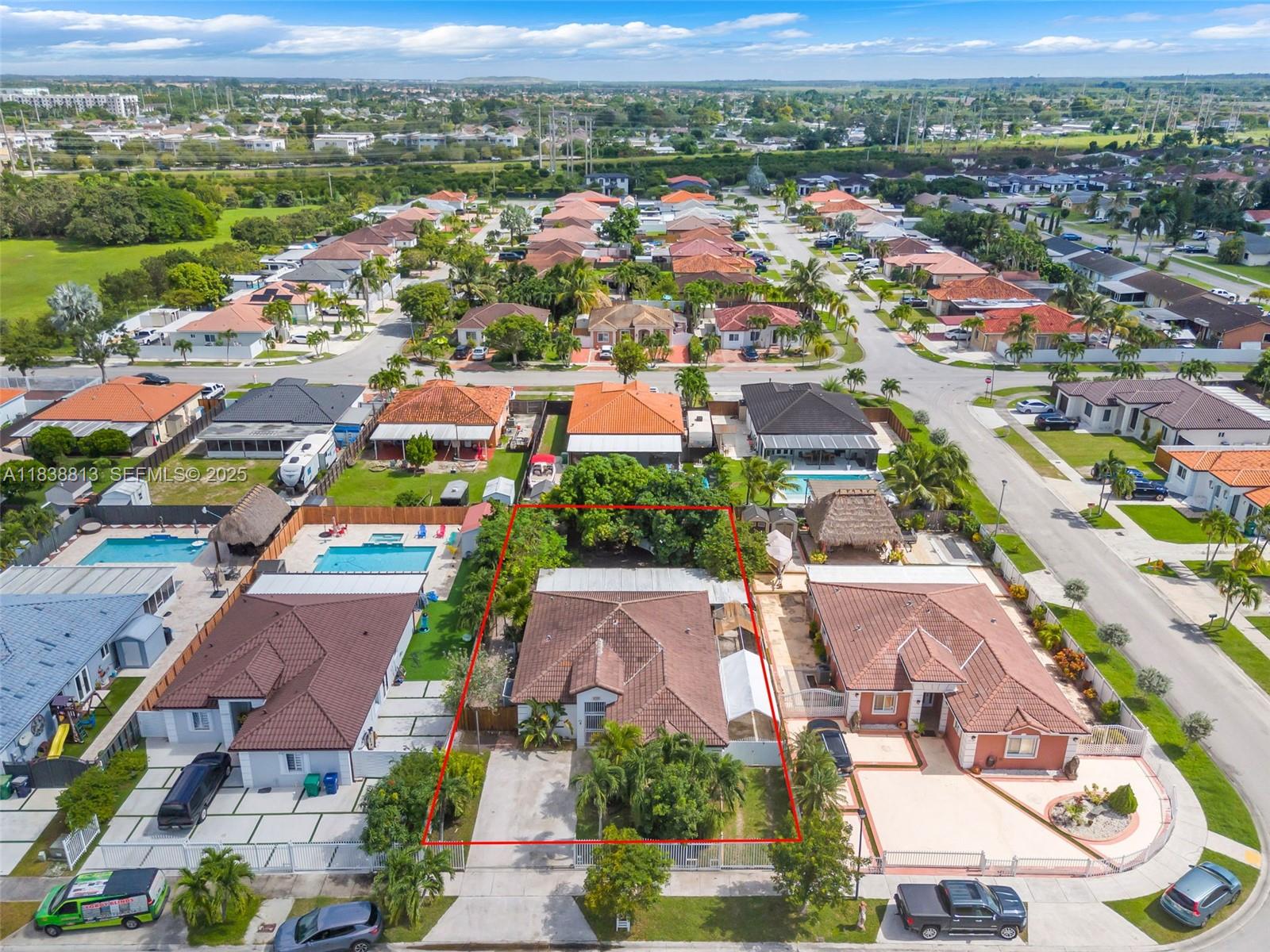 25237 Southwest 133rd Place Homestead, FL 33032 - Photo 8 of 39 an aerial view of residential houses with outdoor space