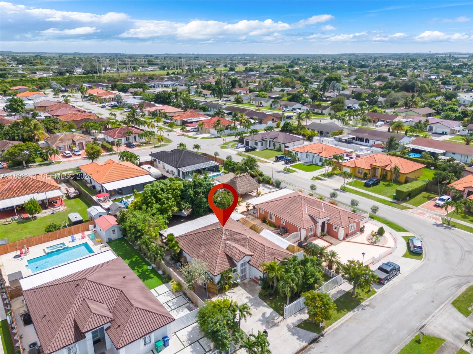 25237 Southwest 133rd Place Homestead, FL 33032 - Photo 10 of 39 an aerial view of residential houses with outdoor space