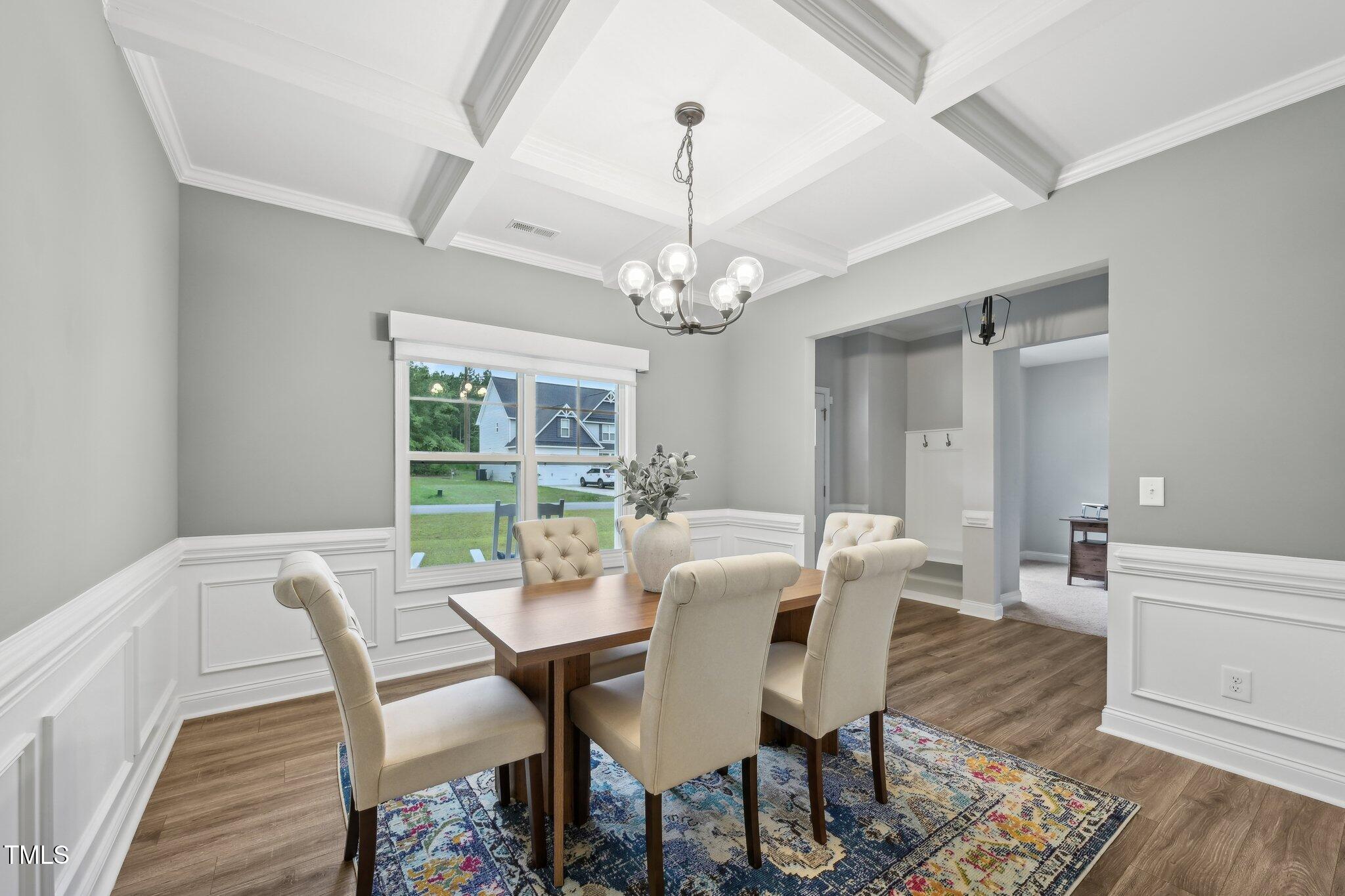 195 Solomon Drive Cameron, NC 28326 - Photo 10 of 46 a view of a dining room with furniture window and wooden floor