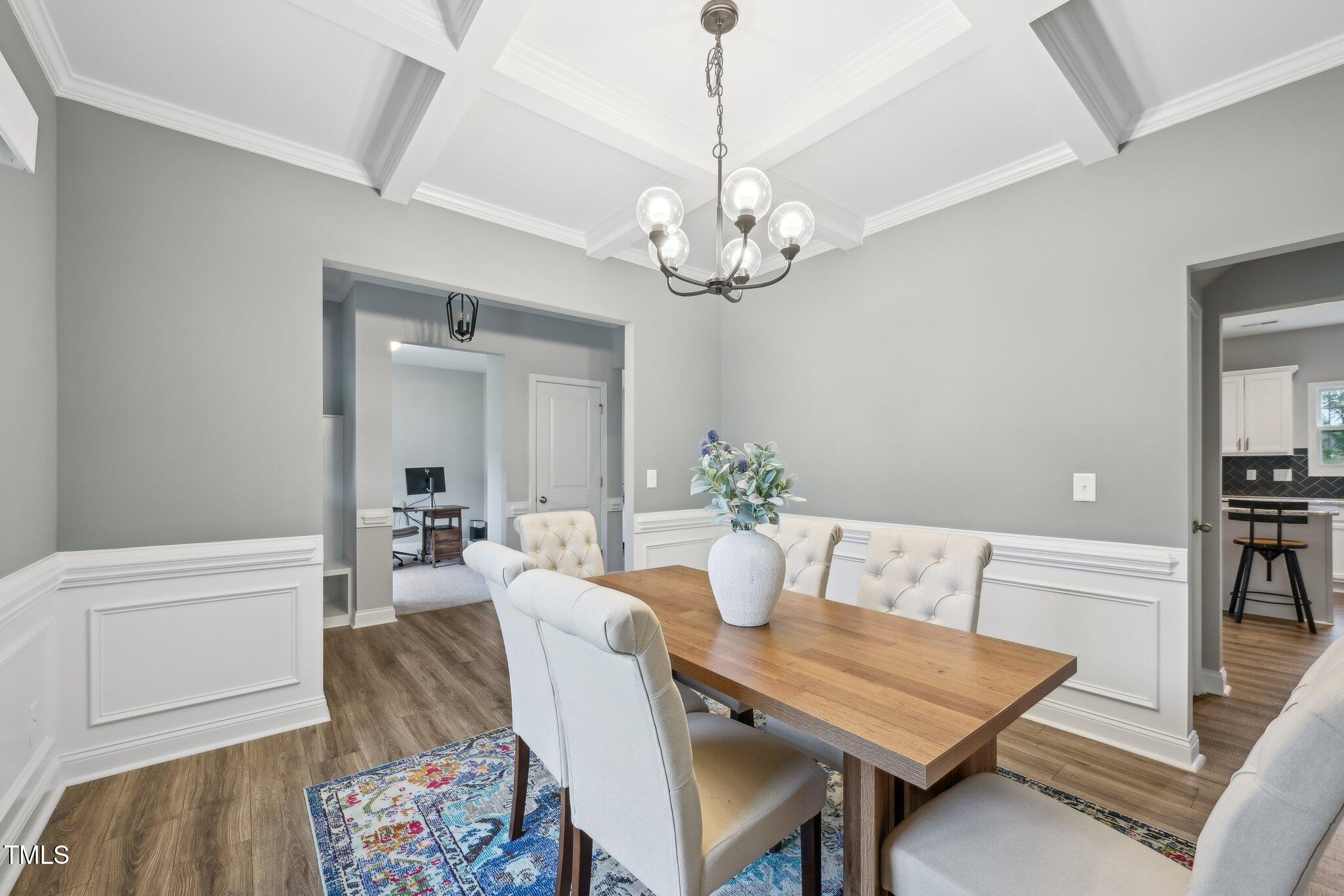 195 Solomon Drive Cameron, NC 28326 - Photo 11 of 46 a view of a dining room with furniture and wooden floor