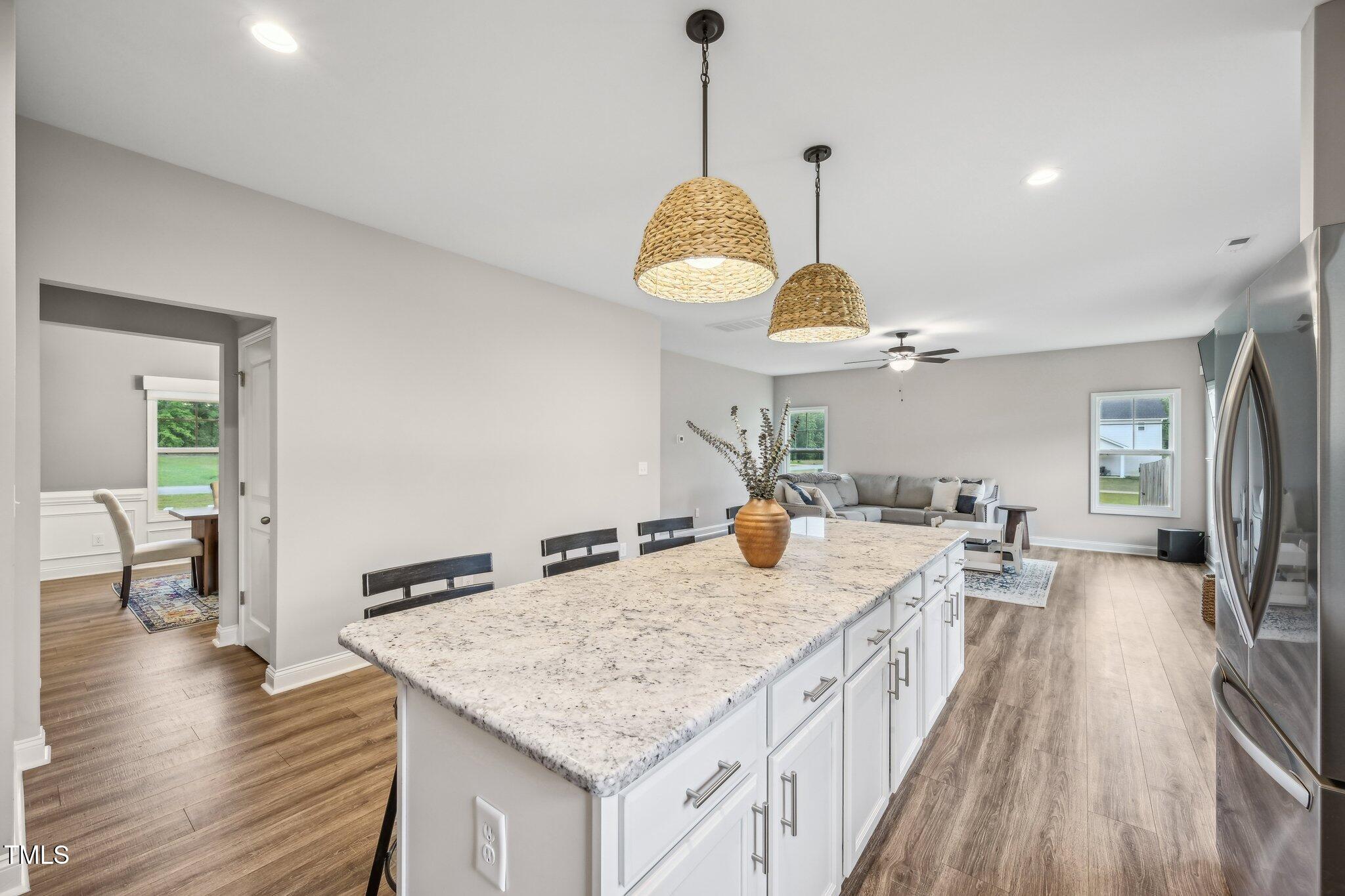 195 Solomon Drive Cameron, NC 28326 - Photo 18 of 46 a kitchen with counter space and wooden floor