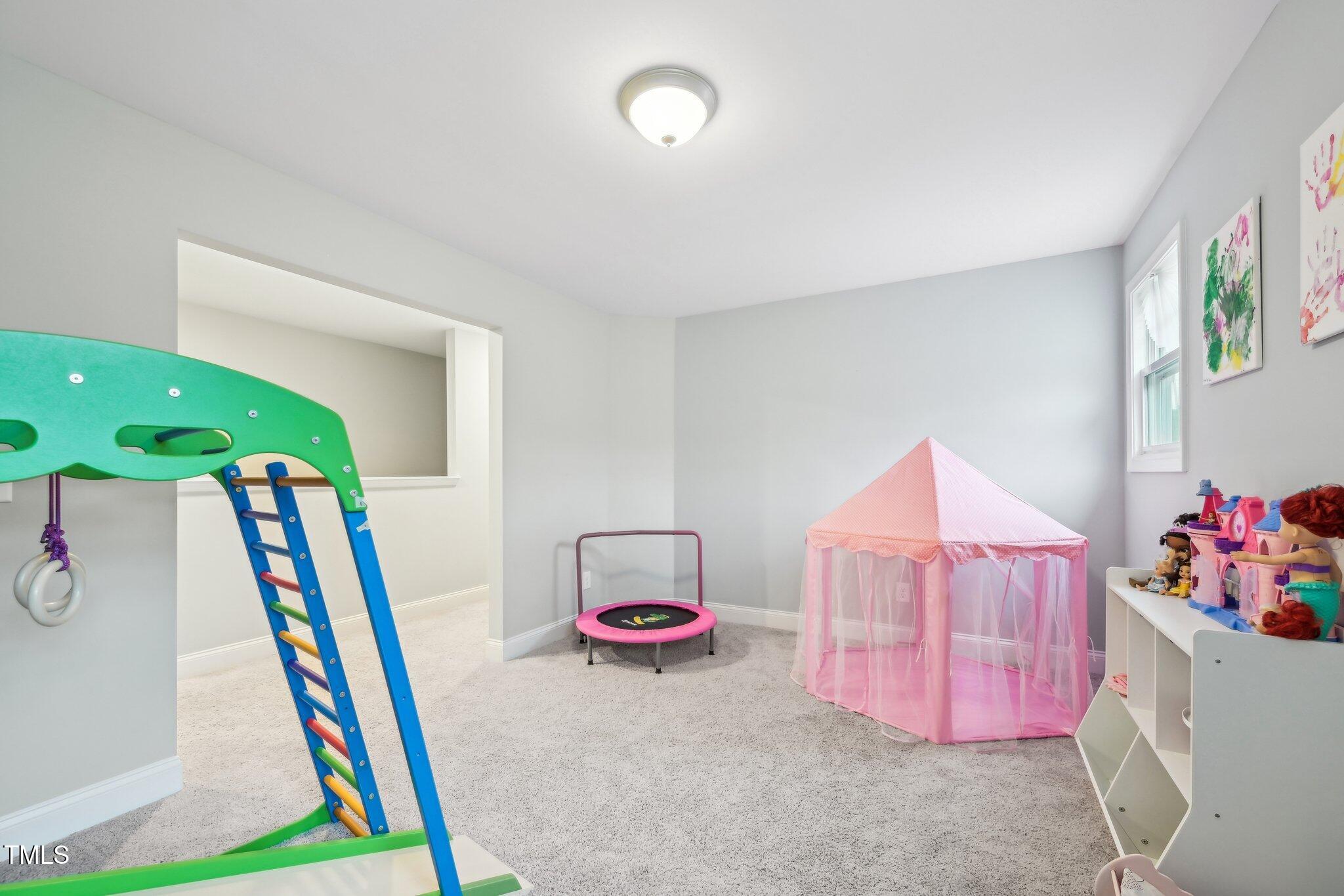 195 Solomon Drive Cameron, NC 28326 - Photo 34 of 46 a bedroom with furniture and a wooden floor