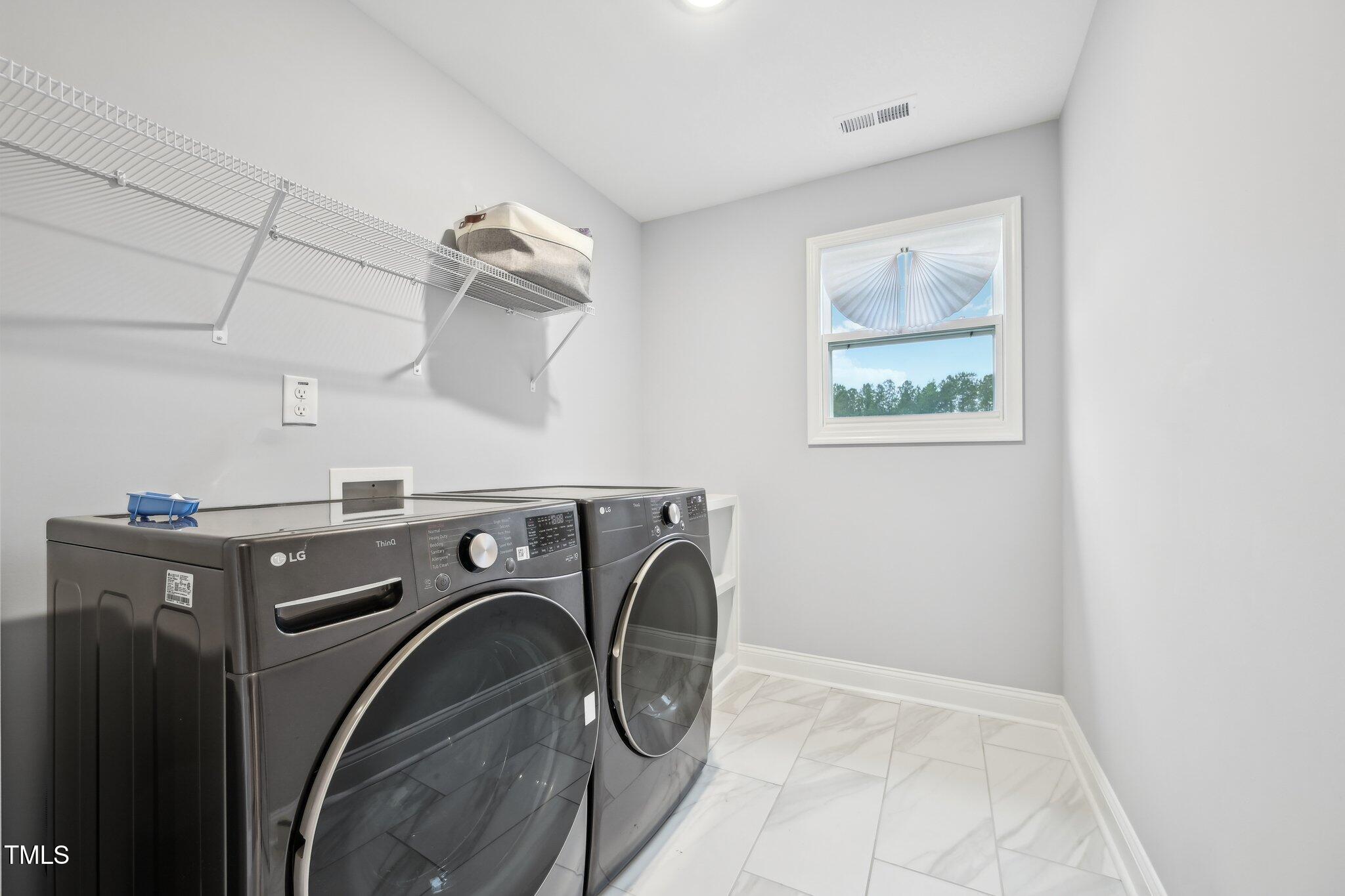 195 Solomon Drive Cameron, NC 28326 - Photo 40 of 46 a utility room with dryer and washer