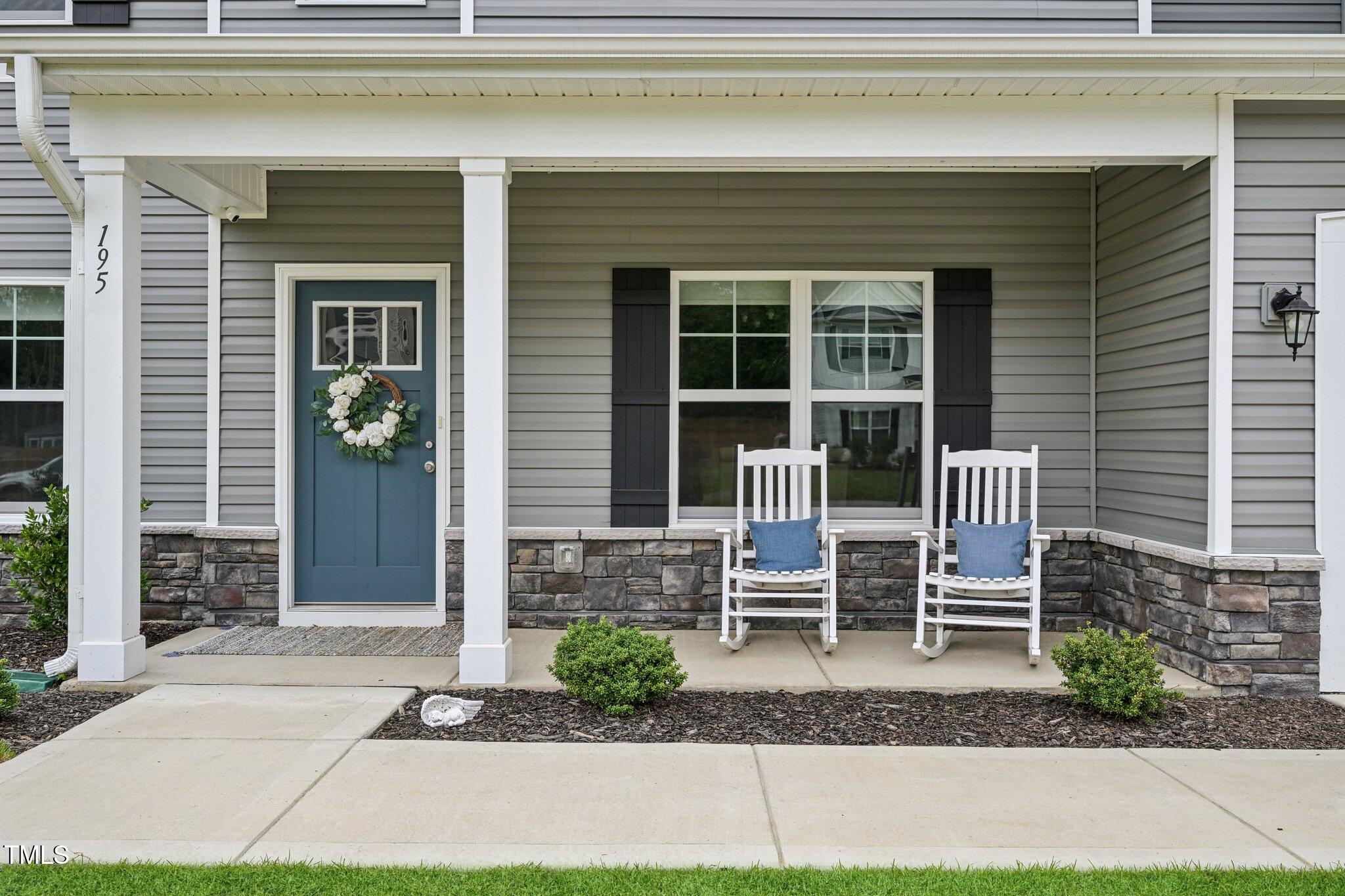 195 Solomon Drive Cameron, NC 28326 - Photo 4 of 46 a front view of a house with a patio