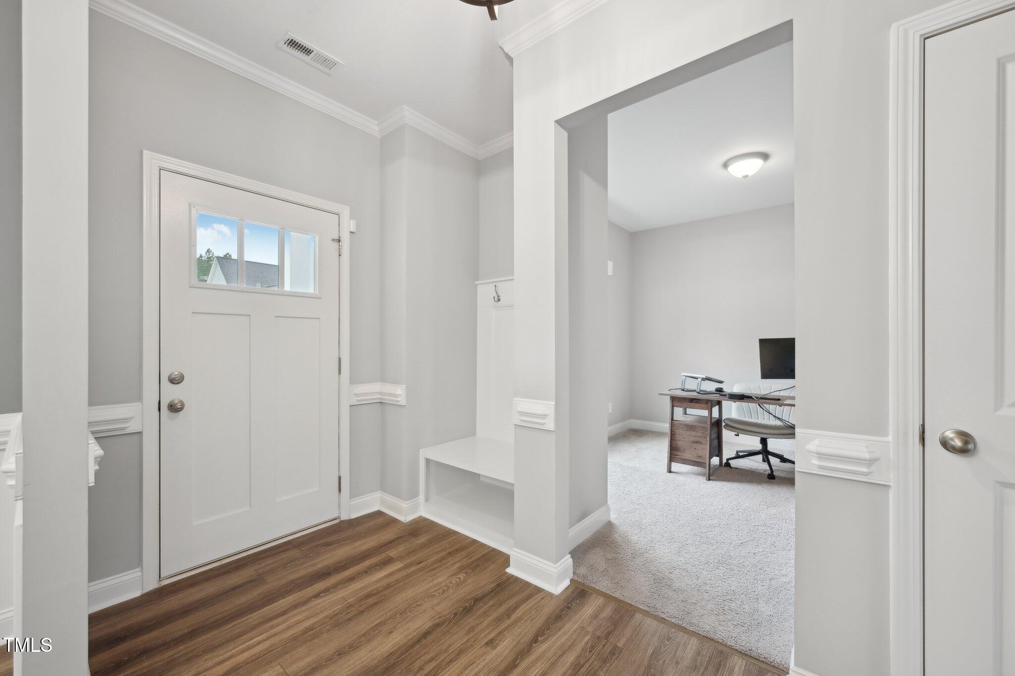 195 Solomon Drive Cameron, NC 28326 - Photo 5 of 46 a view of a room with wooden floor and furniture