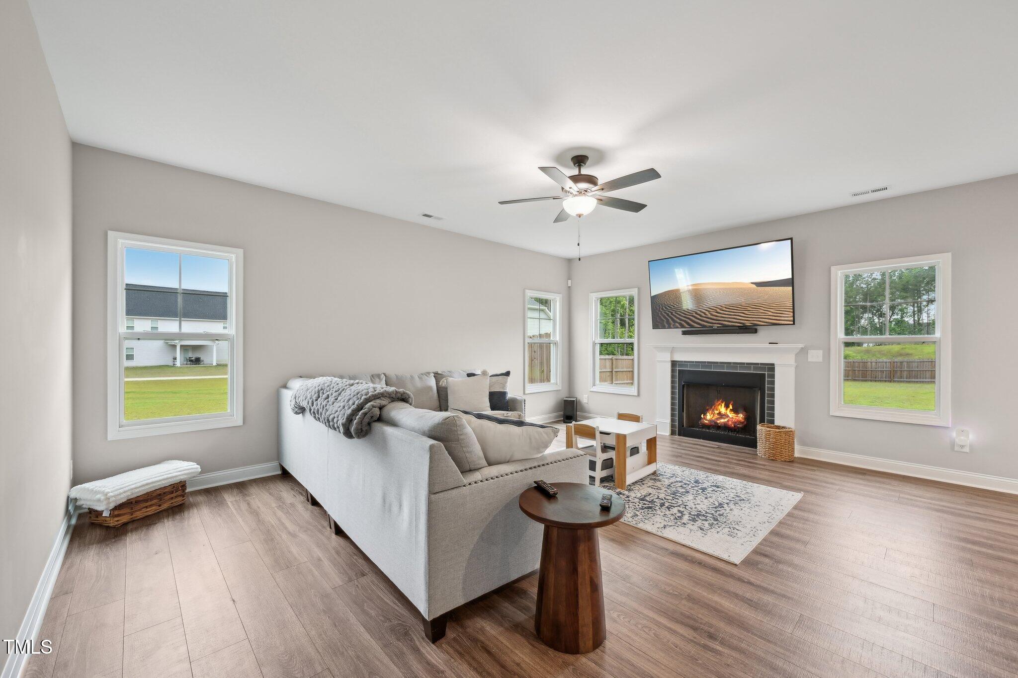 195 Solomon Drive Cameron, NC 28326 - Photo 6 of 46 a living room with furniture and a fireplace
