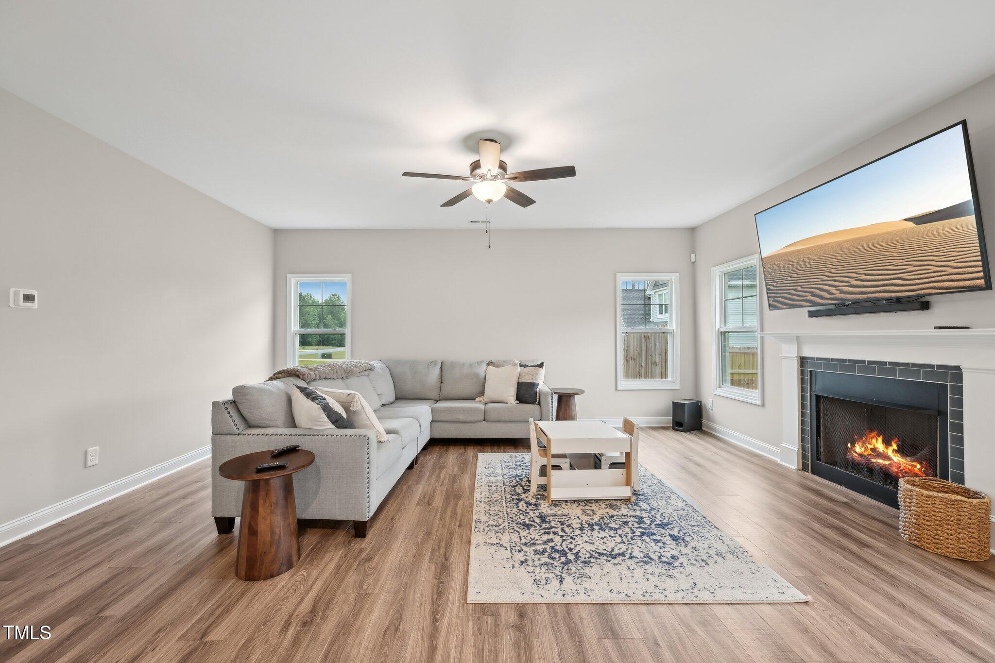 195 Solomon Drive Cameron, NC 28326 - Photo 7 of 46 a living room with furniture and a fireplace