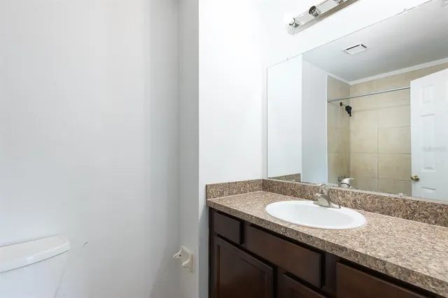 a sink and a granite top with a sink