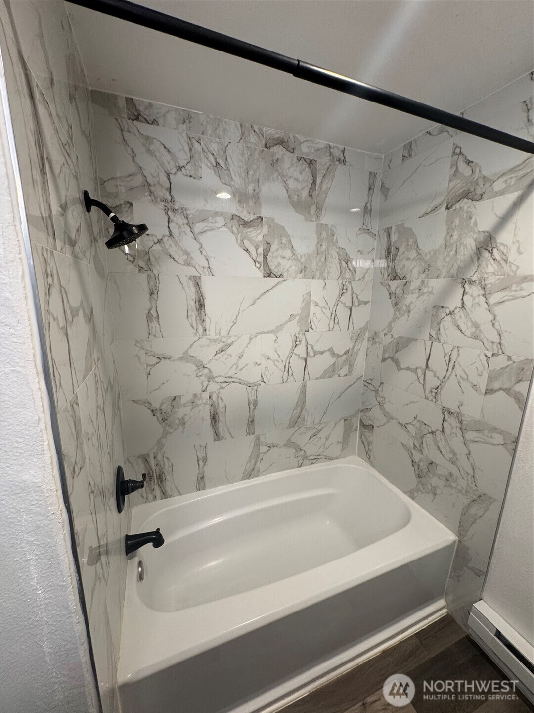 5323 Rumac Street Southeast Lacey, WA 98513 - Photo 11 of 23 a bathroom with a bathtub and shower