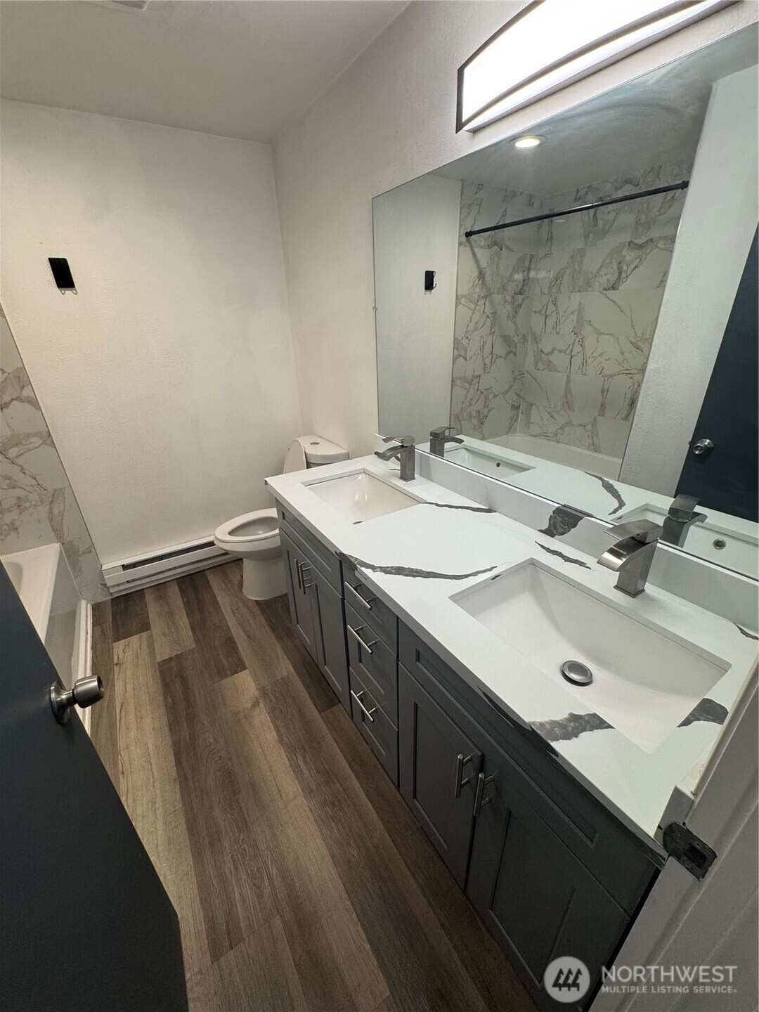 5323 Rumac Street Southeast Lacey, WA 98513 - Photo 13 of 23 a bathroom with a sink and a mirror