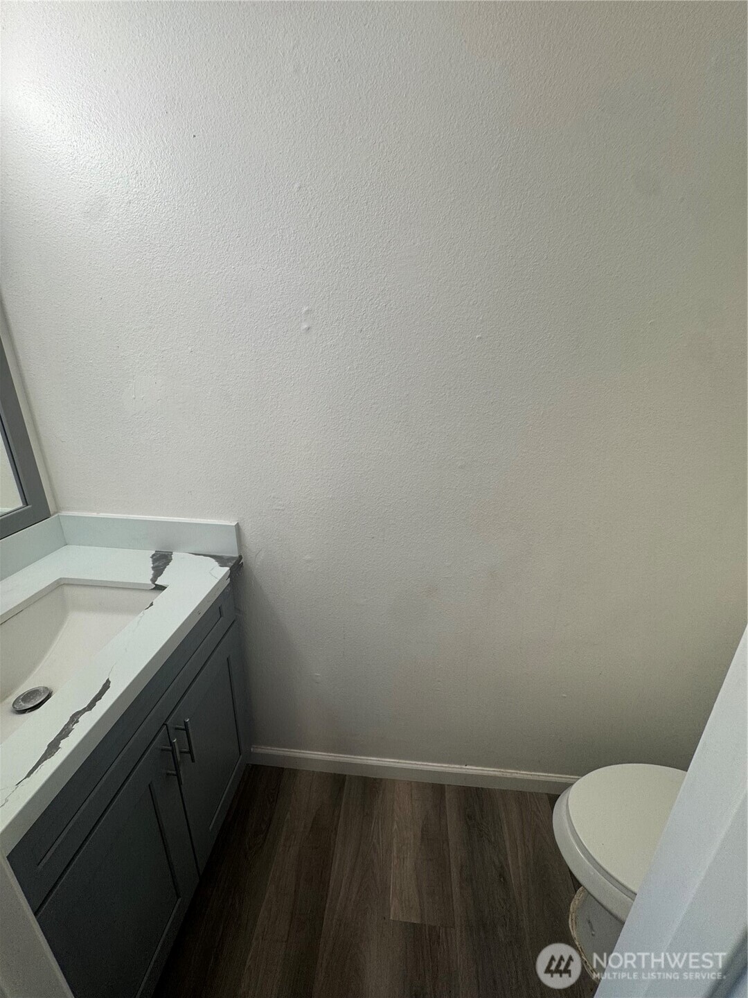 5323 Rumac Street Southeast Lacey, WA 98513 - Photo 14 of 23 a bathroom with a sink and toilet