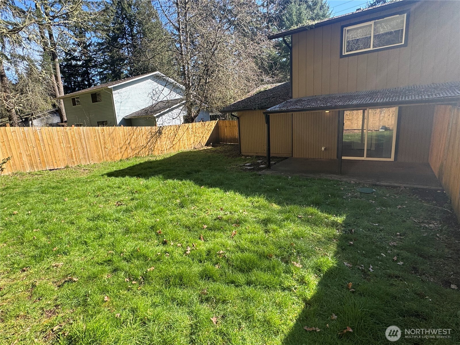 5323 Rumac Street Southeast Lacey, WA 98513 - Photo 2 of 23 a view of a backyard of the house