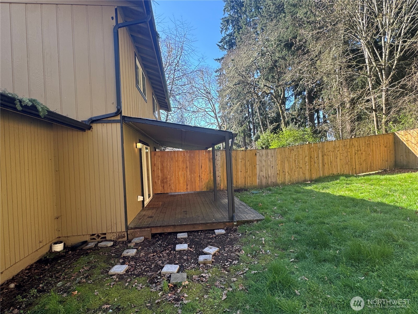 5323 Rumac Street Southeast Lacey, WA 98513 - Photo 21 of 23 a backyard of a house with lots of green space