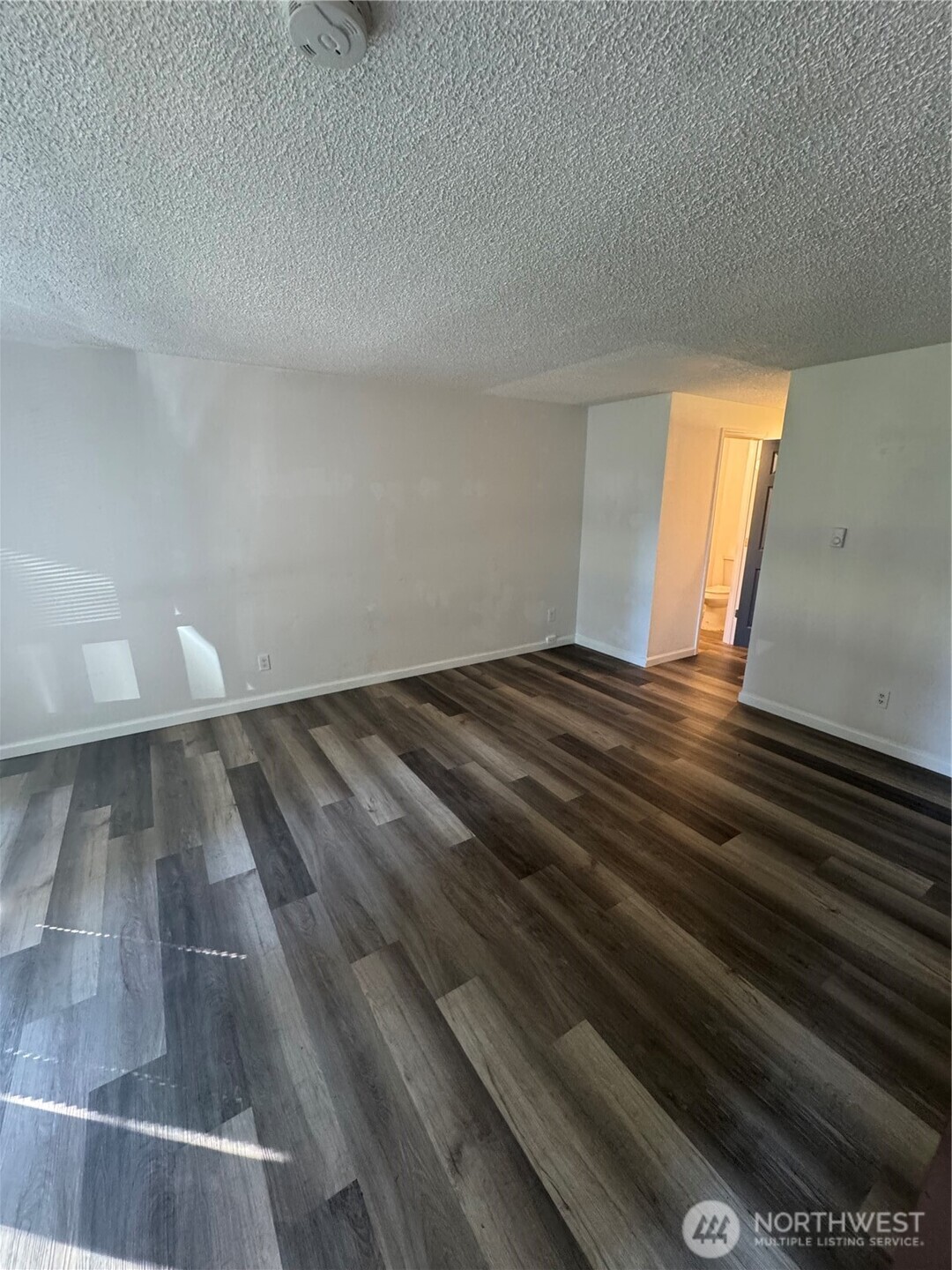 5323 Rumac Street Southeast Lacey, WA 98513 - Photo 5 of 23 a view of wooden floor