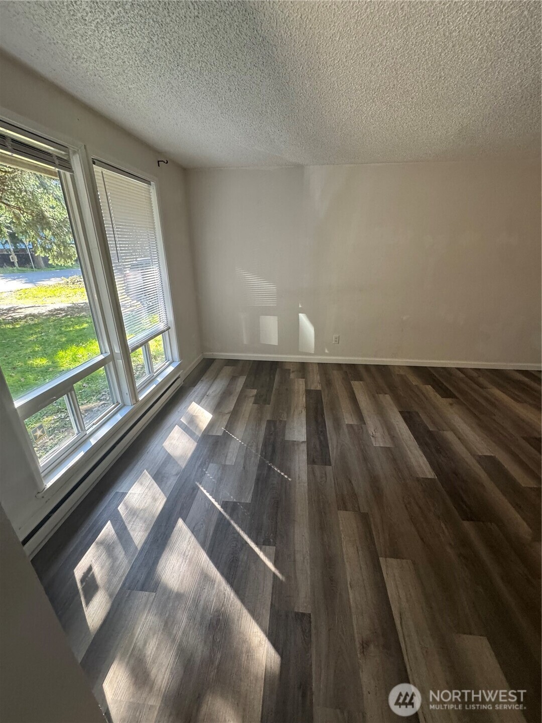 5323 Rumac Street Southeast Lacey, WA 98513 - Photo 6 of 23 a view of an empty room and window