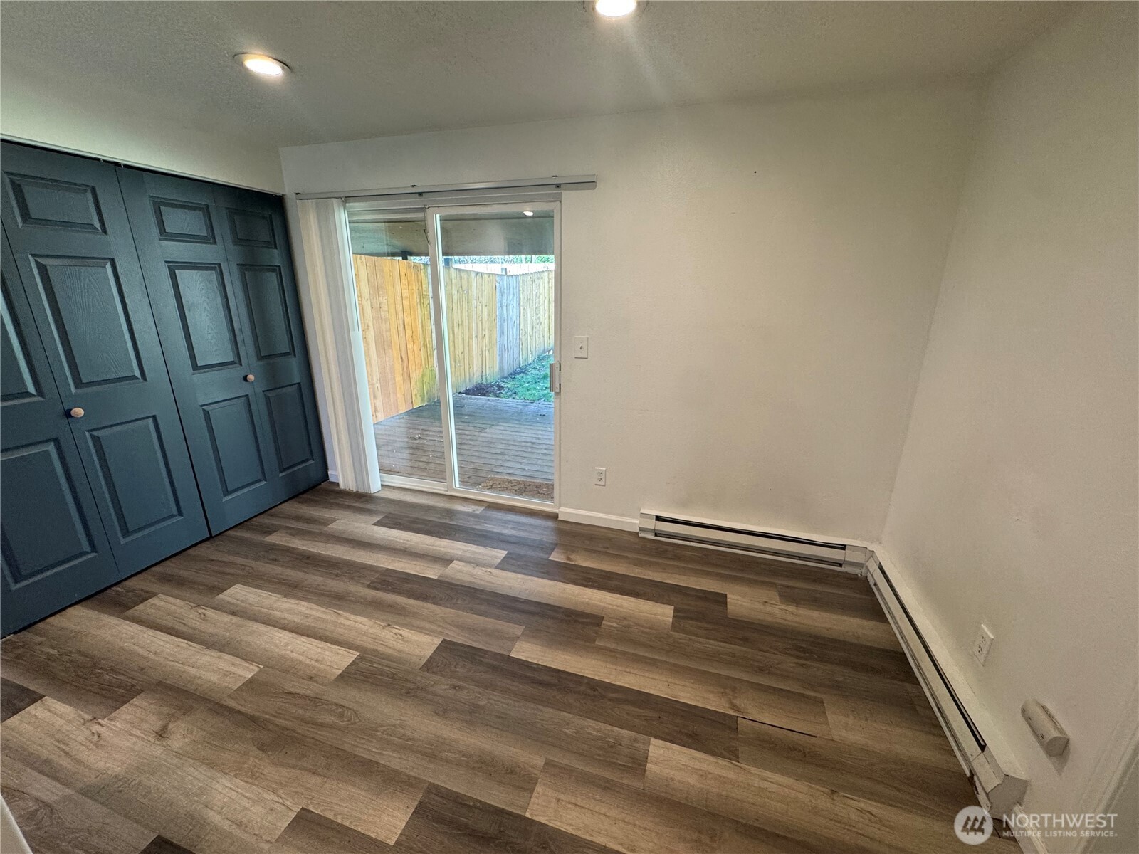 5323 Rumac Street Southeast Lacey, WA 98513 - Photo 9 of 23 a view of room with wooden floor and tub