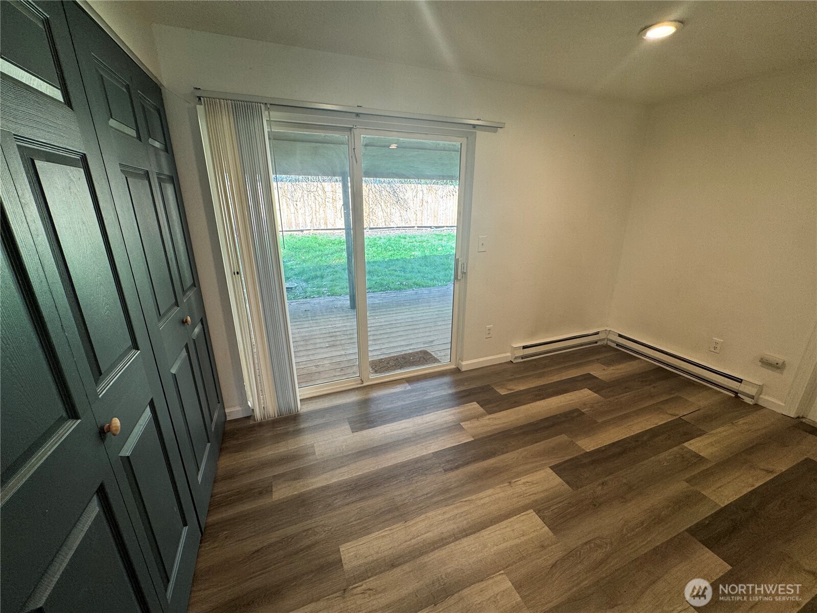 5323 Rumac Street Southeast Lacey, WA 98513 - Photo 10 of 23 a view of empty room with wooden floor and fan